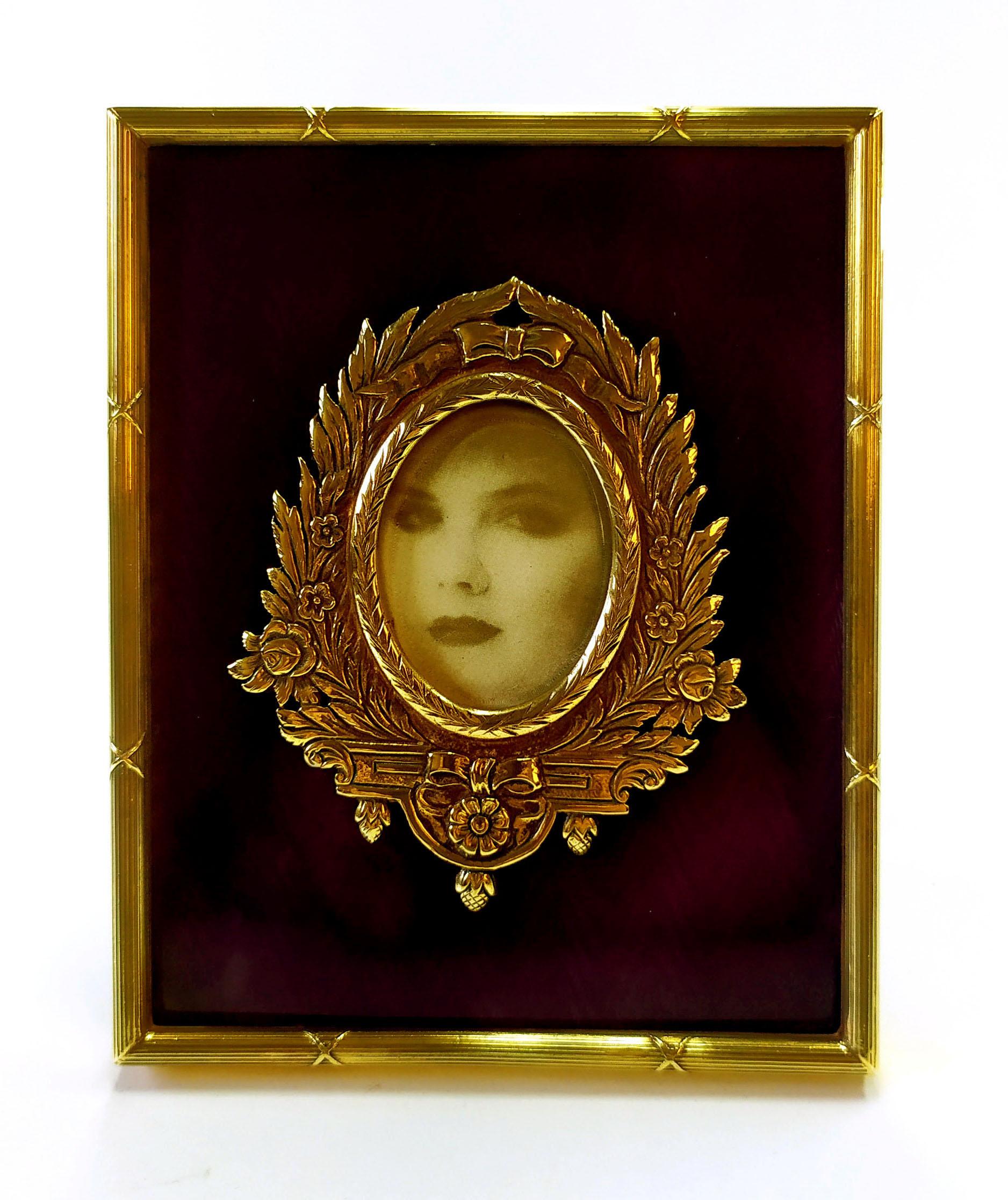 Rectangular table frame for oval photos cm. 3 x 4 in 925/1000 sterling silver gold plated with translucent fired enamel, plum purple, on guilloche, with French Empire Louis XVI style borders and ornaments, 18th century. External cm. 10.2 x 11.7.
