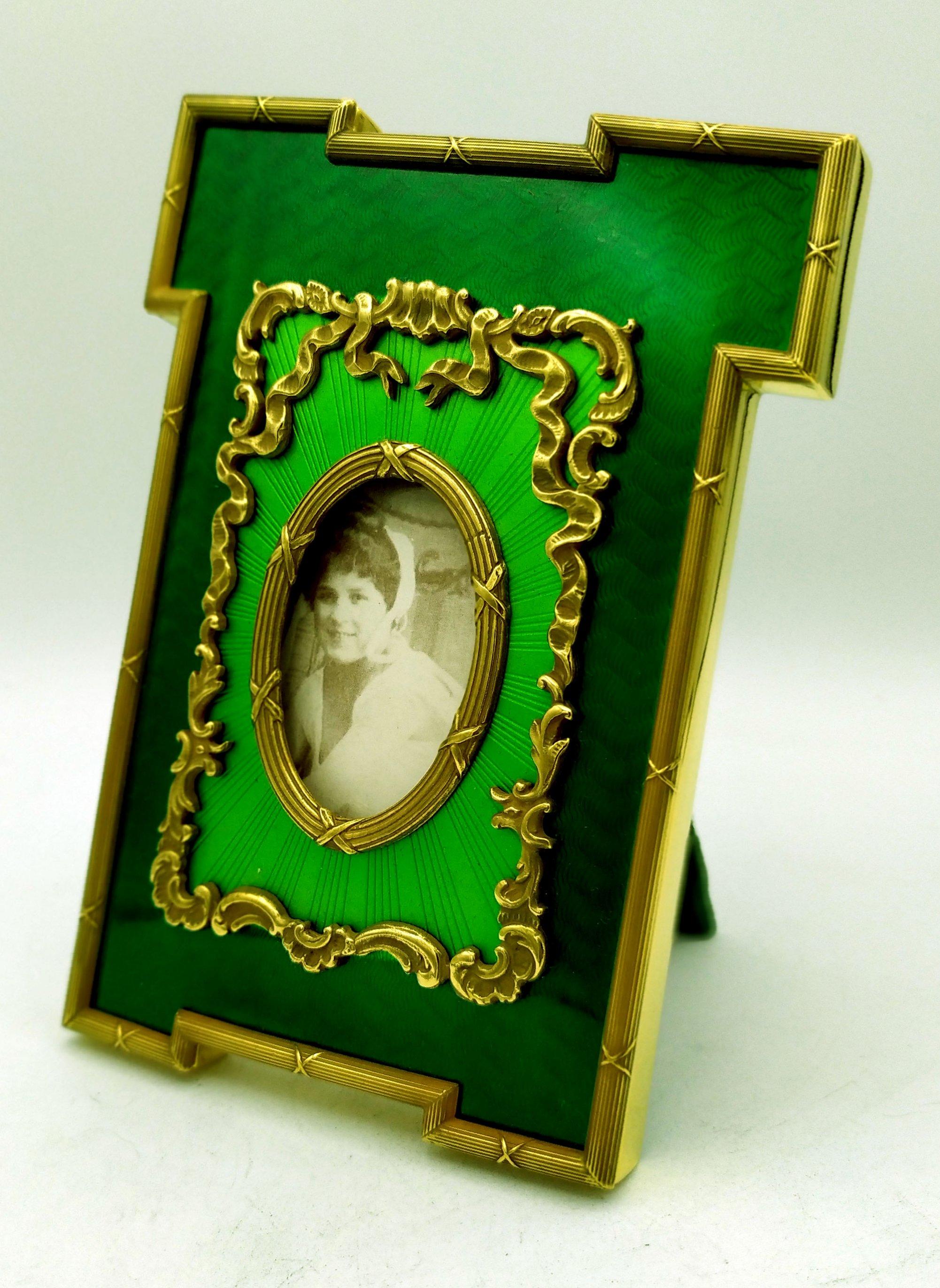 This important Picture Frame Green is in 925/1000 sterling silver gold plated 24 carats. It is rectangular shaped photo frame.
The surface of this Picture Frame Green is fired enamel translucent  on guilloche and French Empire Napoleon III style