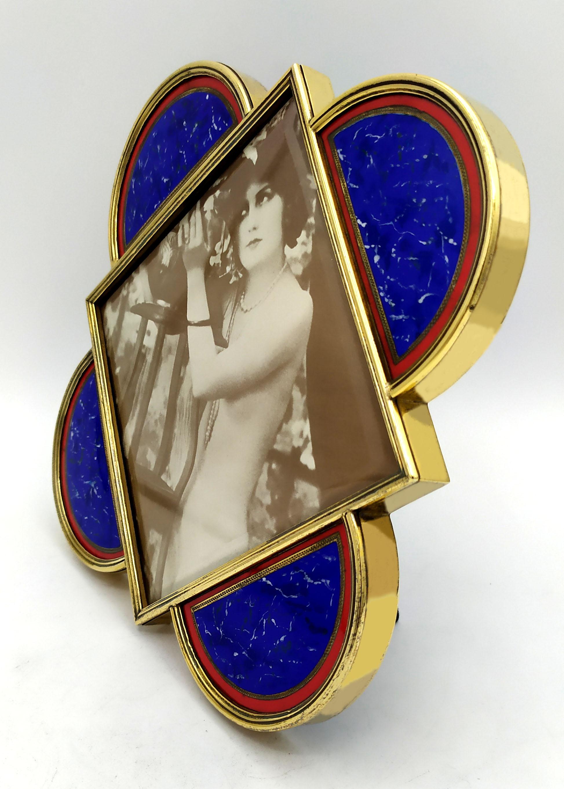 Large photo frame in 925/1000 sterling silver gold plated with painted fire enamels like lapis lazuli stone. Shaping taken from the tiles of the North Door of the Baptistery of the Florence Cathedral by Filippo Brunelleschi in pure Florentine