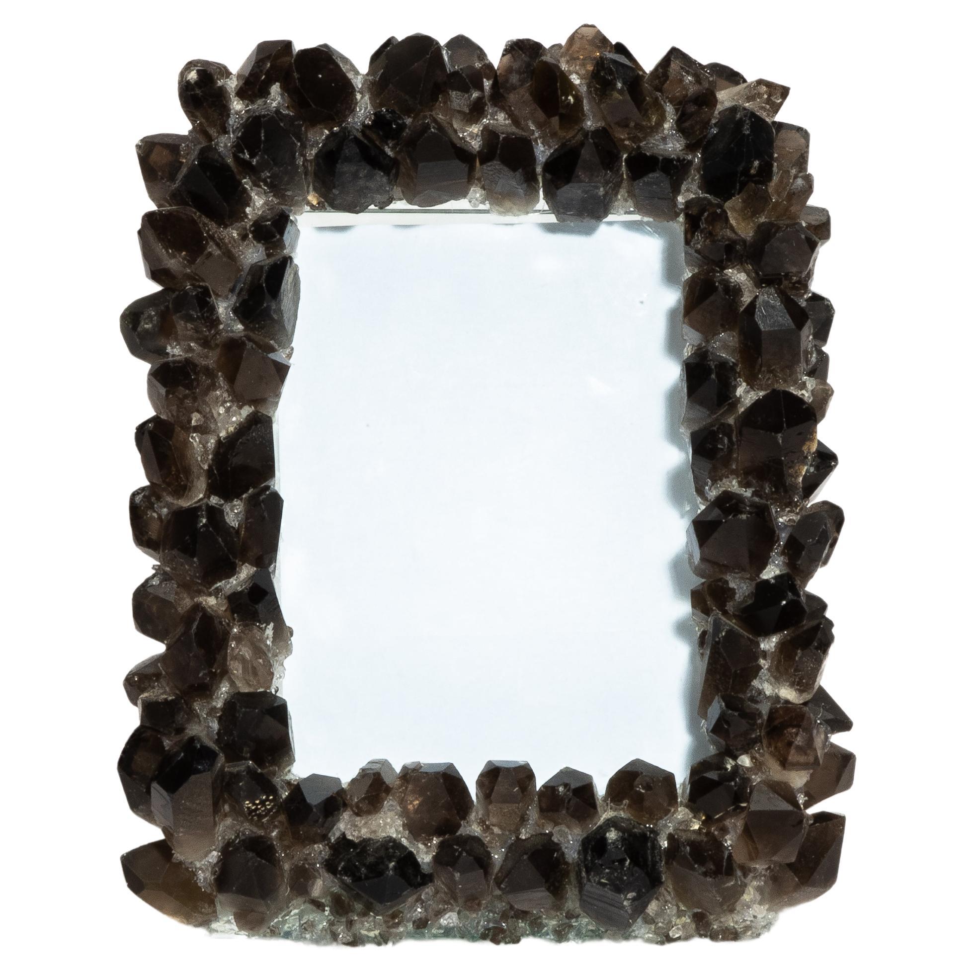 Kathryn McCoy is a designer renowned for her exquisite home decor pieces that highlight the natural beauty of crystals. Beginning her career in New York City's fashion industry, Kathryn transitioned her keen eye for style into creating unique decor