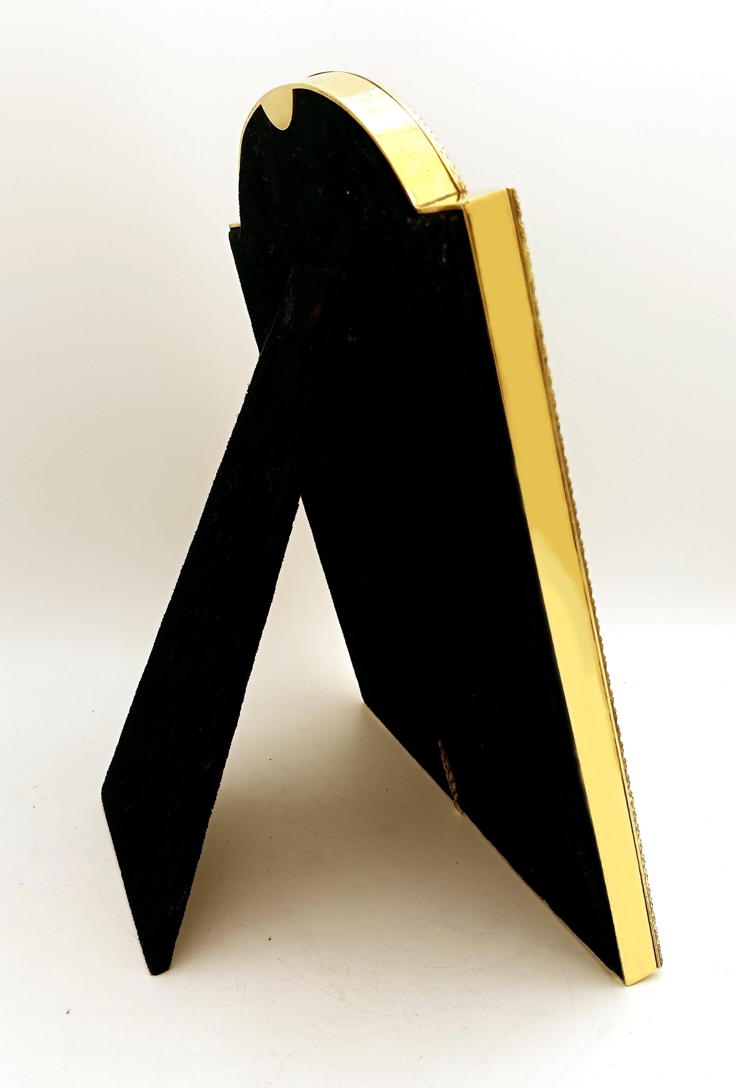 Rectangular frame with a convex shaped upper side in gold-plated 925/1000 sterling silver and translucent fired enamel on guilloché, with external and internal borders in the French Empire Napoleon III style. External dimensions: 18 x 23.3 cm,