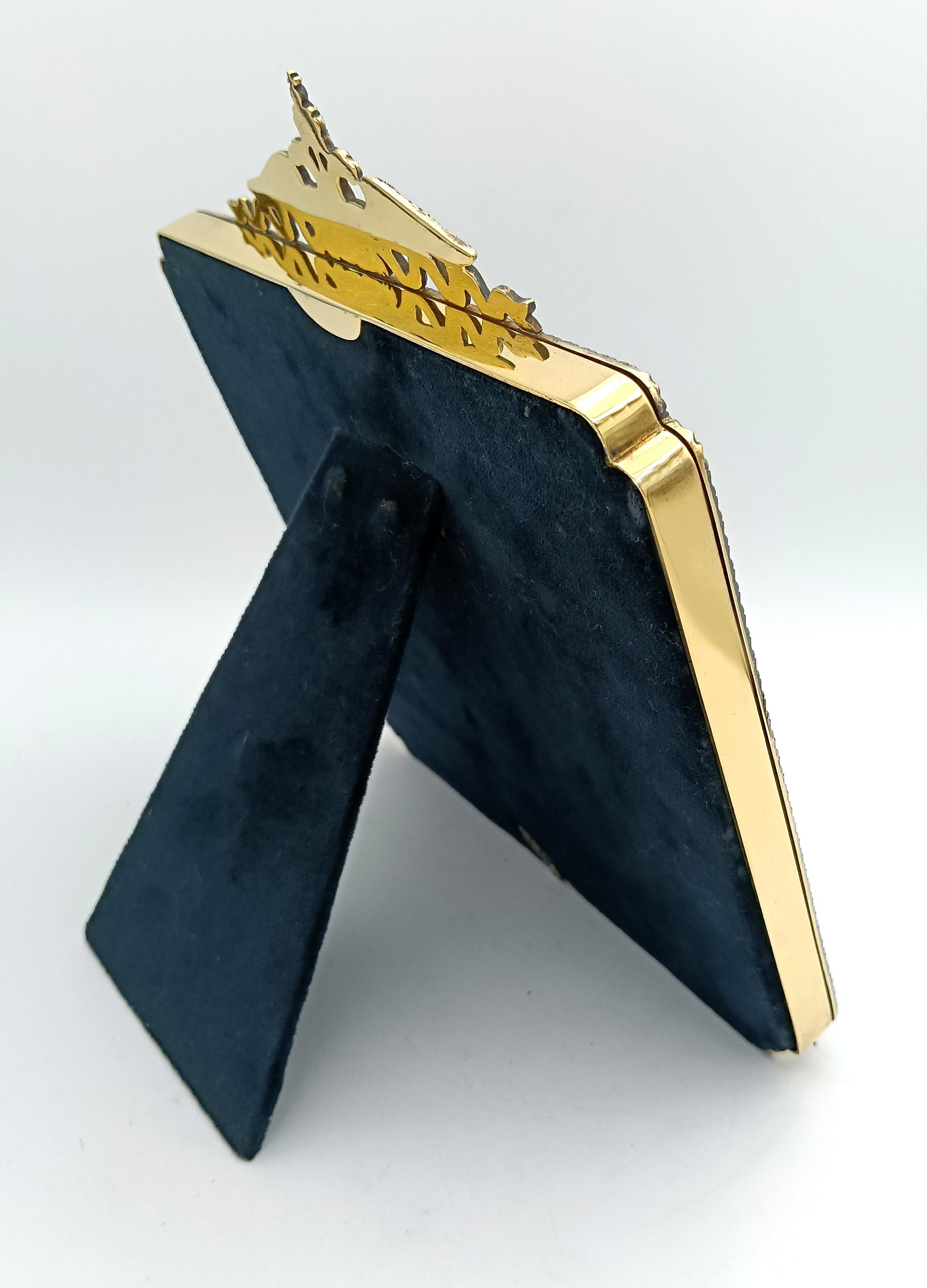 quare table frame in 925/1000 sterling silver gold plated with translucent fired enamel on guillochè with edges and ornaments in French Empire Napoleon III style. External cm. 18 x 22, internal cm. 12 x 12. Weight gr. 462. Designed by Giorgio