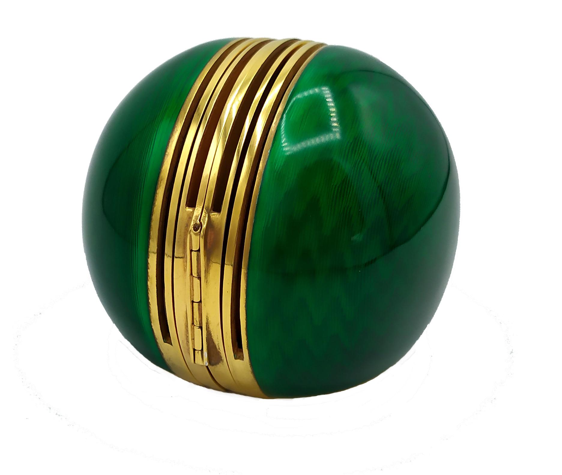 Spherical shape frame for 4 hinged photographs in 925/1000 sterling silver gold plated with translucent fired enamels on guillochè. Modern contemporary style. Sphere measures 7.5 cm diameter. Weight gr. 390- Designed by Giorgio Salimbeni in 1968 and