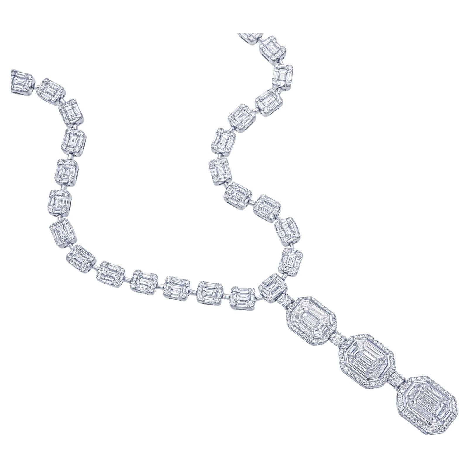 This is a grand Necklace with all around diamonds 
Emerald illusion features precisely arranged diamonds that resemble an emerald-cut stone
This dazzling 18kt white gold 16 inch necklace showcases 12.50 cts of round, Baguette & Pie cut diamonds,