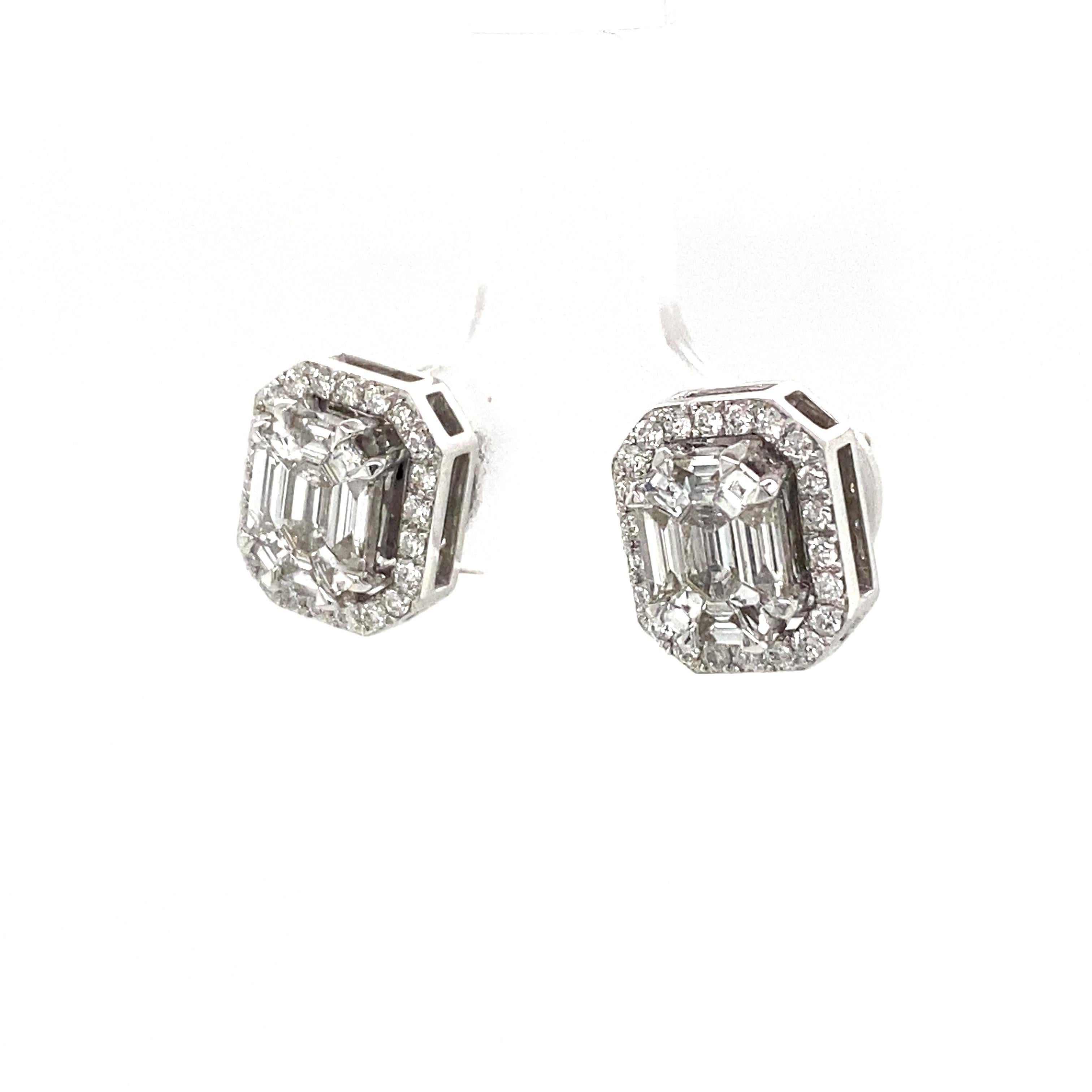 Pie Cut Emerald Diamond Earring and Jacket in 14K White Gold.  The Center Piece Cut Emerald Diamonds weigh 0.78 carat total weight, the Round Brilliant Cut Diamonds expertly set in the Earring Jacket weigh 0.26 carat total weight, Emeralds and Round