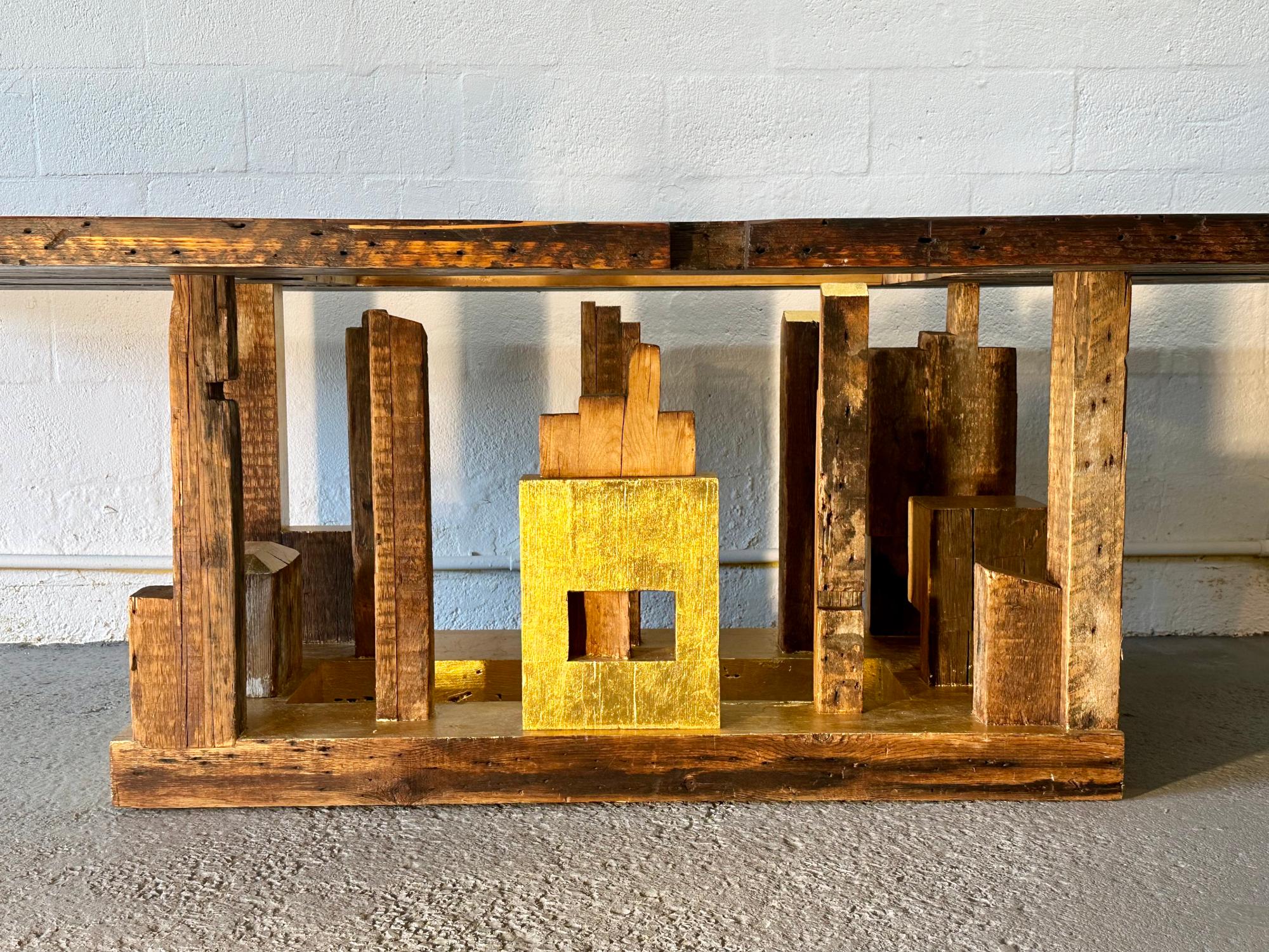 Rafael designed and handcrafted the Piece of New York Dining Table from the reclaimed 150-year-old Douglas fir beams he salvaged from Manhattan townhomes. Their surfaces are aged with a beautiful golden brown patina; saw marks, nails, bolt holes,