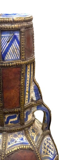 Pieced Painted And Leather Pieces and Brass Trim Vase, Morocco, 19th Century
