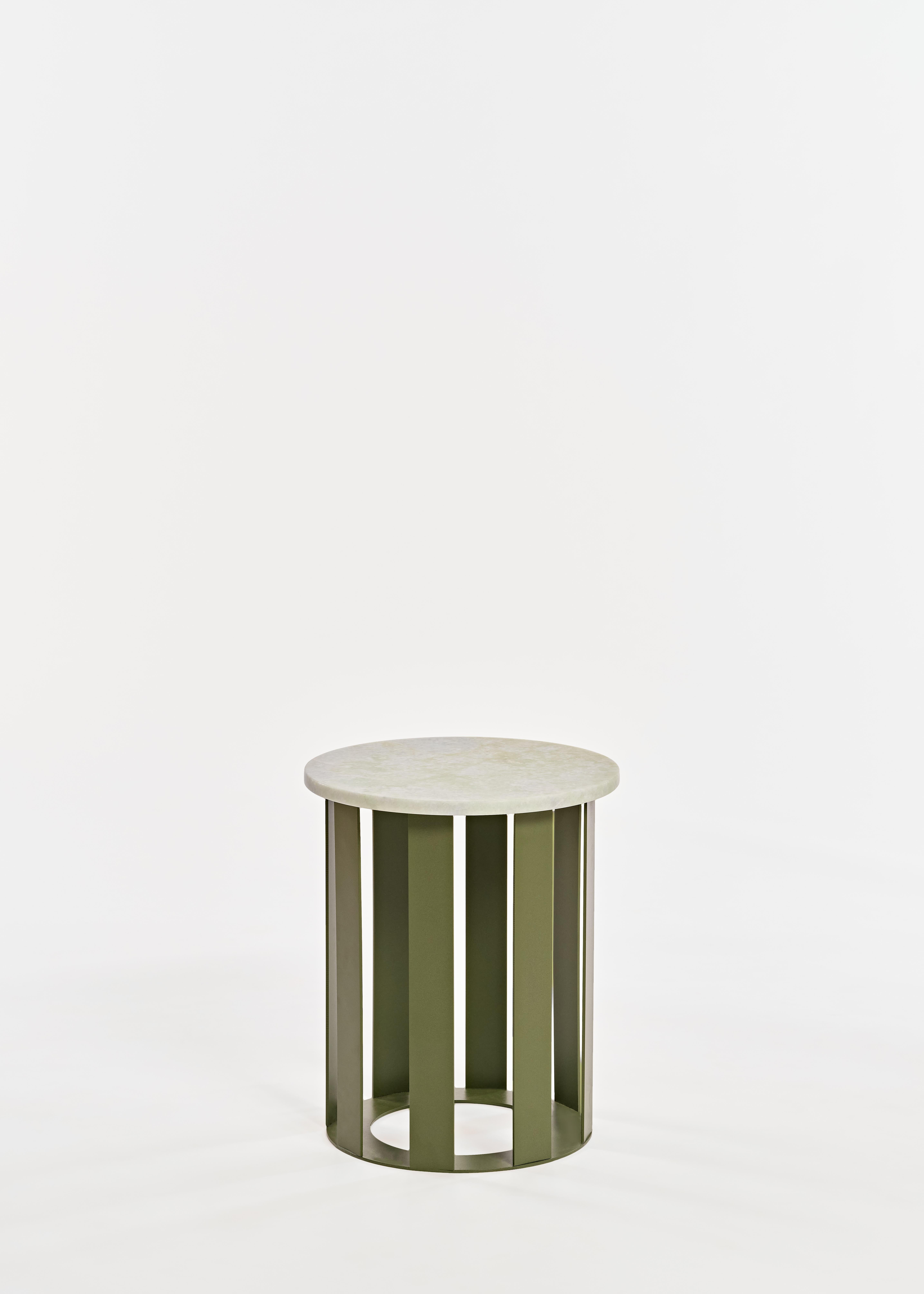 The Float series surfaces slightly overhang the rounded basket base. Perfect as a side table, nightstand, or stool. Such a nice piece. Powder coated metal base; terrazzo stone top.

Customize your own with our assortment of surface and color