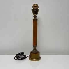Pied de lampe en bakelite ambré et laiton doré style Jansen