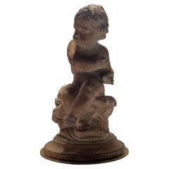 Pied de lampe en platre patiné terre cuite signé cherubin enfant