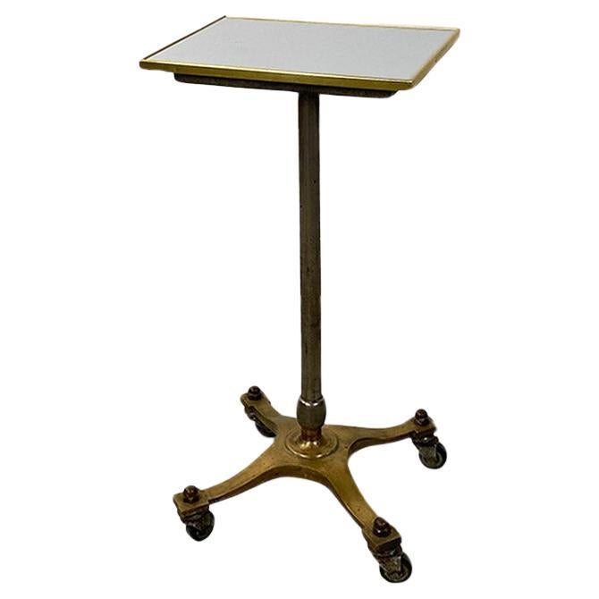 Italian modern antique brass and formica pedestal or side table, ca. 1950. For Sale