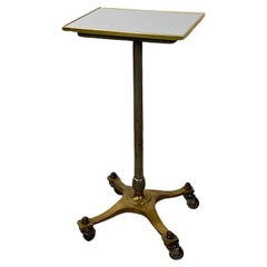 Italian modern antique brass and formica pedestal or side table, ca. 1950.