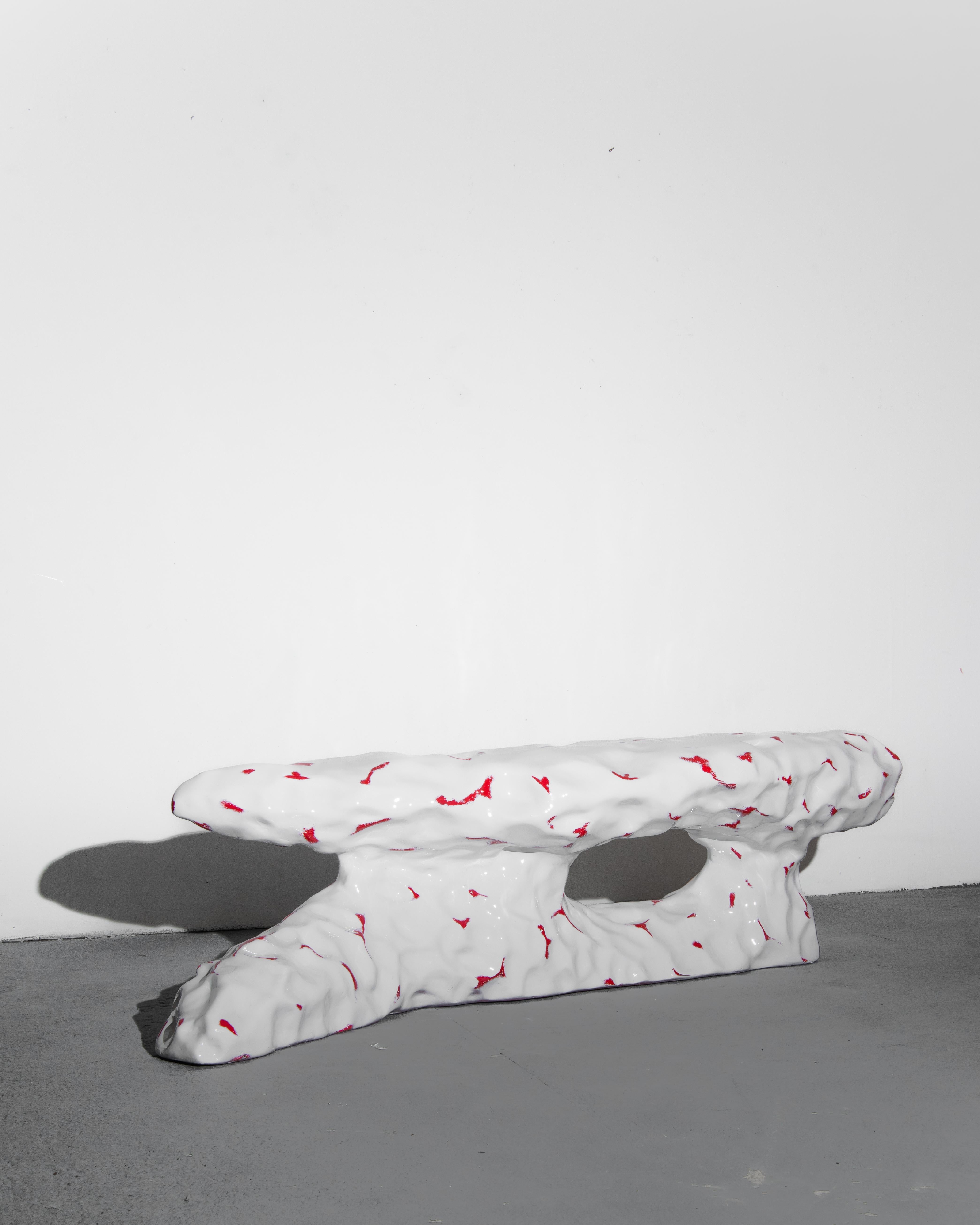 Piedra bench by Alberto Vitelio
Material: Fiberglass, resin, polyurethane paint.
Dimensions: W 167 x H 46 x D 40 cm.

Alberto Vitelio was born in Santiago de Chile in 1990, in a newly installed democracy after 17 years of military-civic