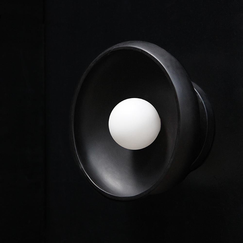 Mid-Century Modern Sconce in Hand Carved Black Marble, Piedra Lighting Collection For Sale