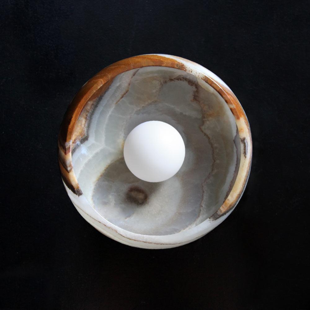 Mid-Century Modern Sconce in Hand Carved Terra Onyx , Piedra Lighting Collection For Sale