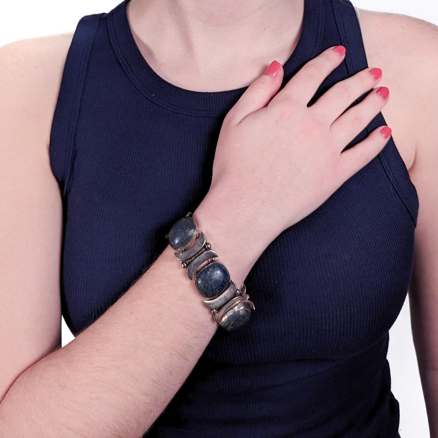An rare Mexcian sterling silver and sodalite link bracelet by Felipe Martinez for Piedra Y Plata. 

With shaped silver alternately set with sodalite cabochons. The sodalite gemstones are smooth to the touch and the silver is gentle on the arm.

This