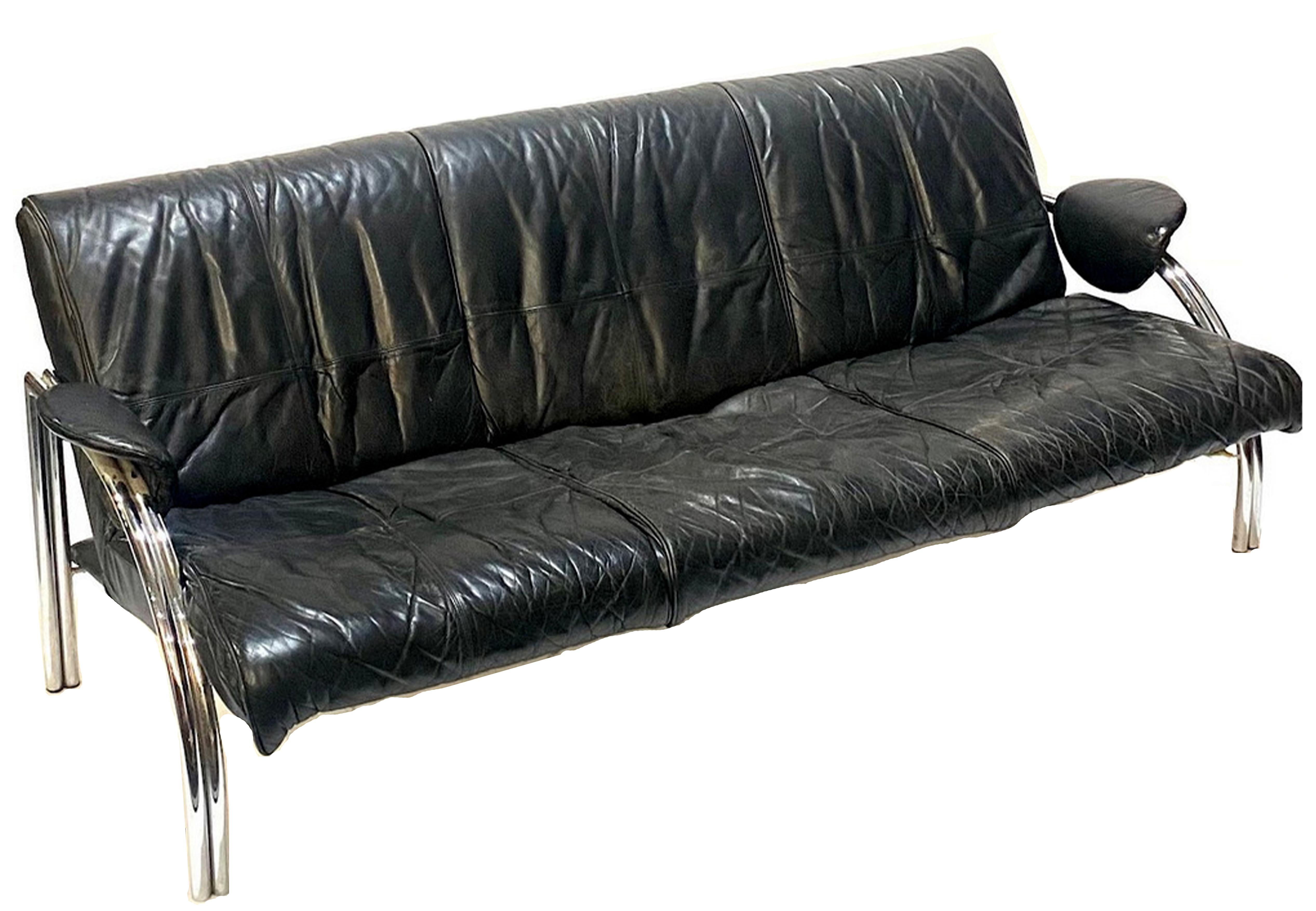 Rare canapé trois places Steele & Co Art Deco à armature en cuir noir et acier tubulaire chromé des années 1970, conçu par Mark Lawson

Images supplémentaires de croquis originaux, non fournis avec le canapé. 
