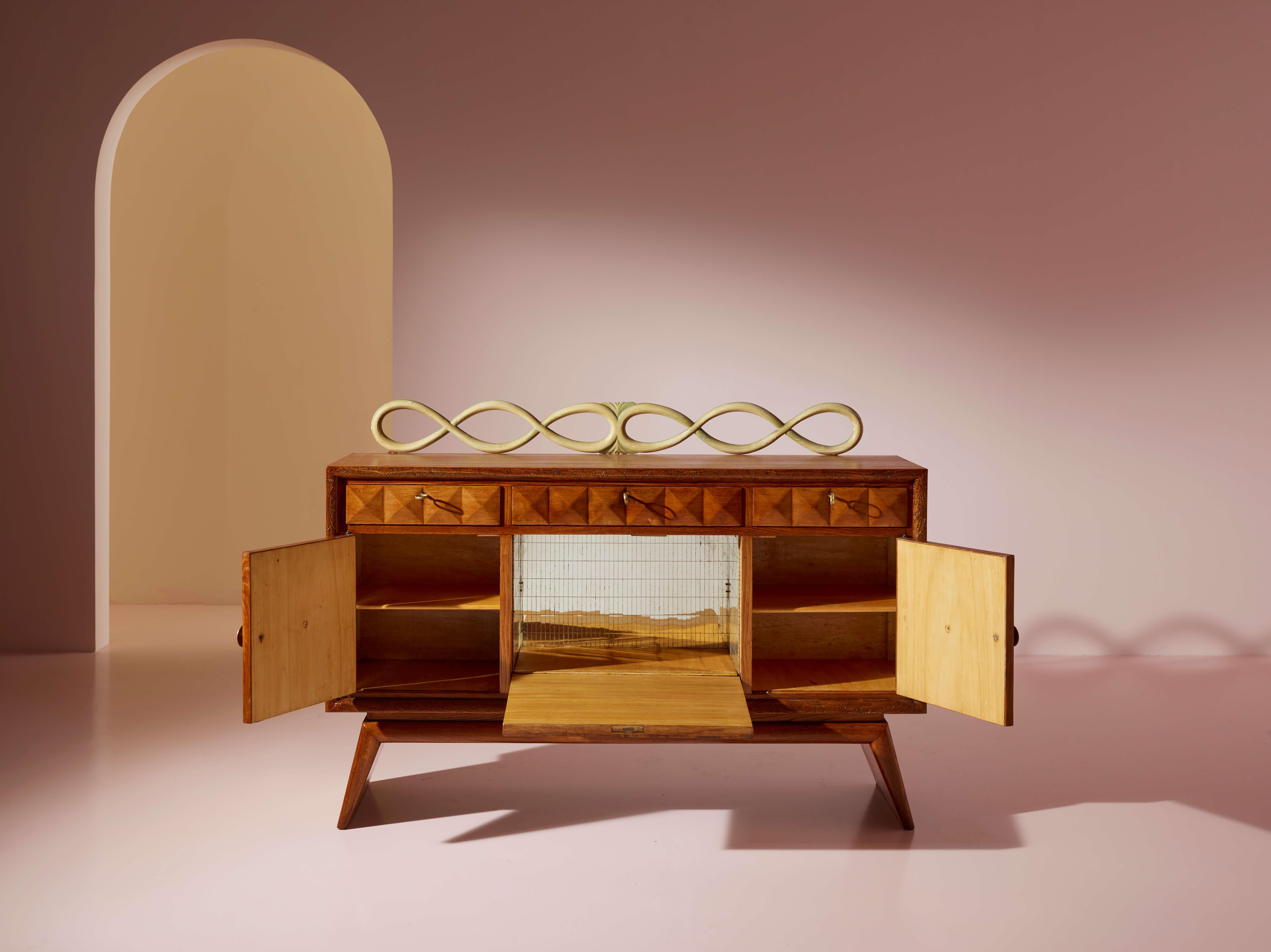 Mid-Century Modern Pieluigi Colli carved oak sideboard with mirrored inserts, Italy, 1940s For Sale