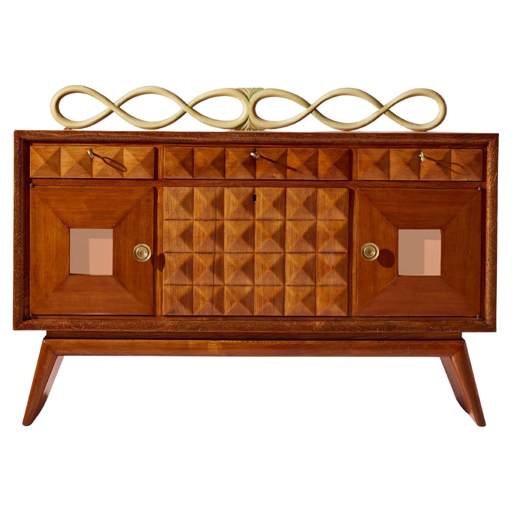 Pieluigi Colli carved oak sideboard with mirrored inserts, Italy, 1940s