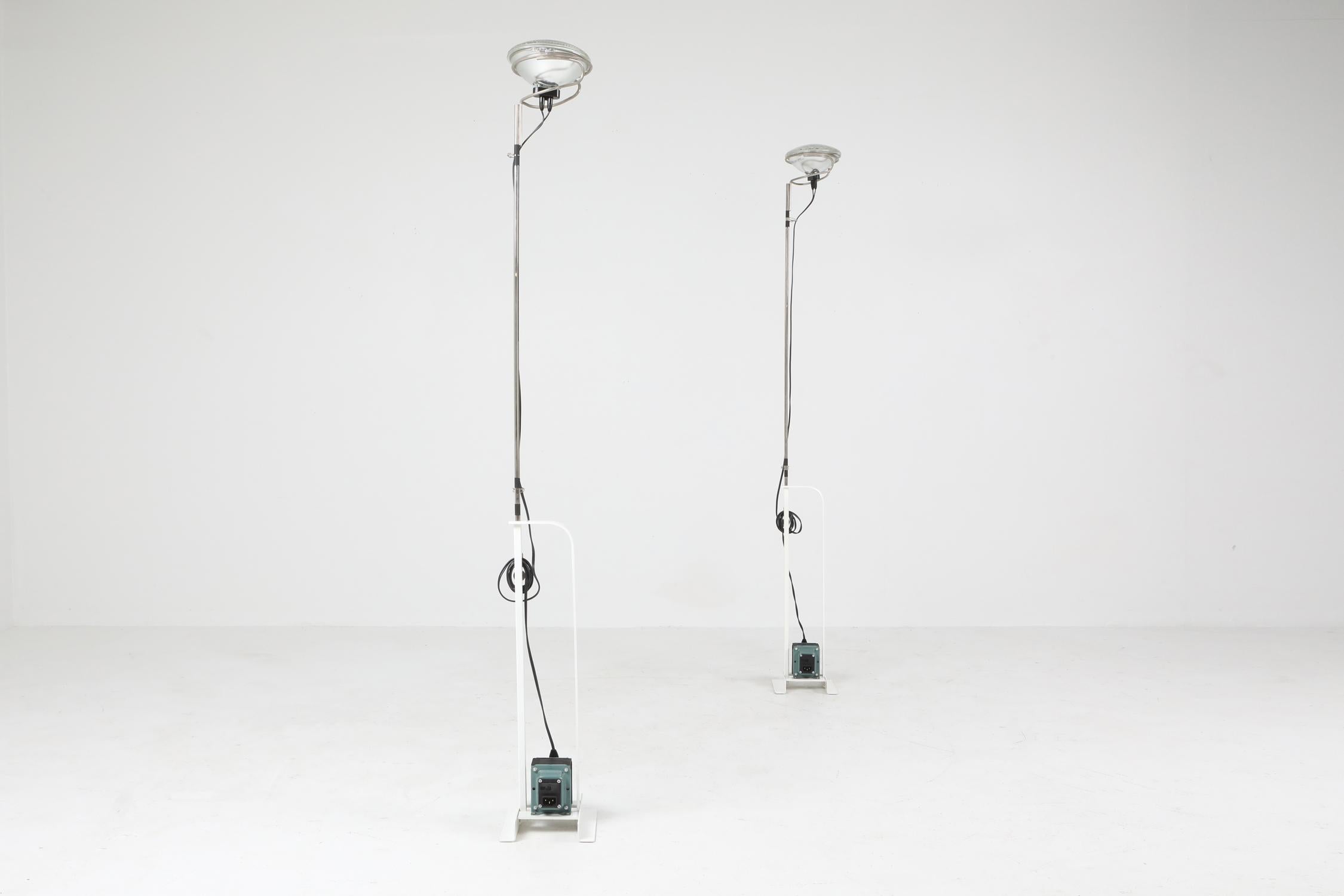 Flos Toio floor lamp in white. The designers Pier Giacomo and Achille Castiglion named it after the word thoy. This inventive lamp blends an Industrial style with a timeless and whimsical design.
This lamp has garnered awards and even earning a
