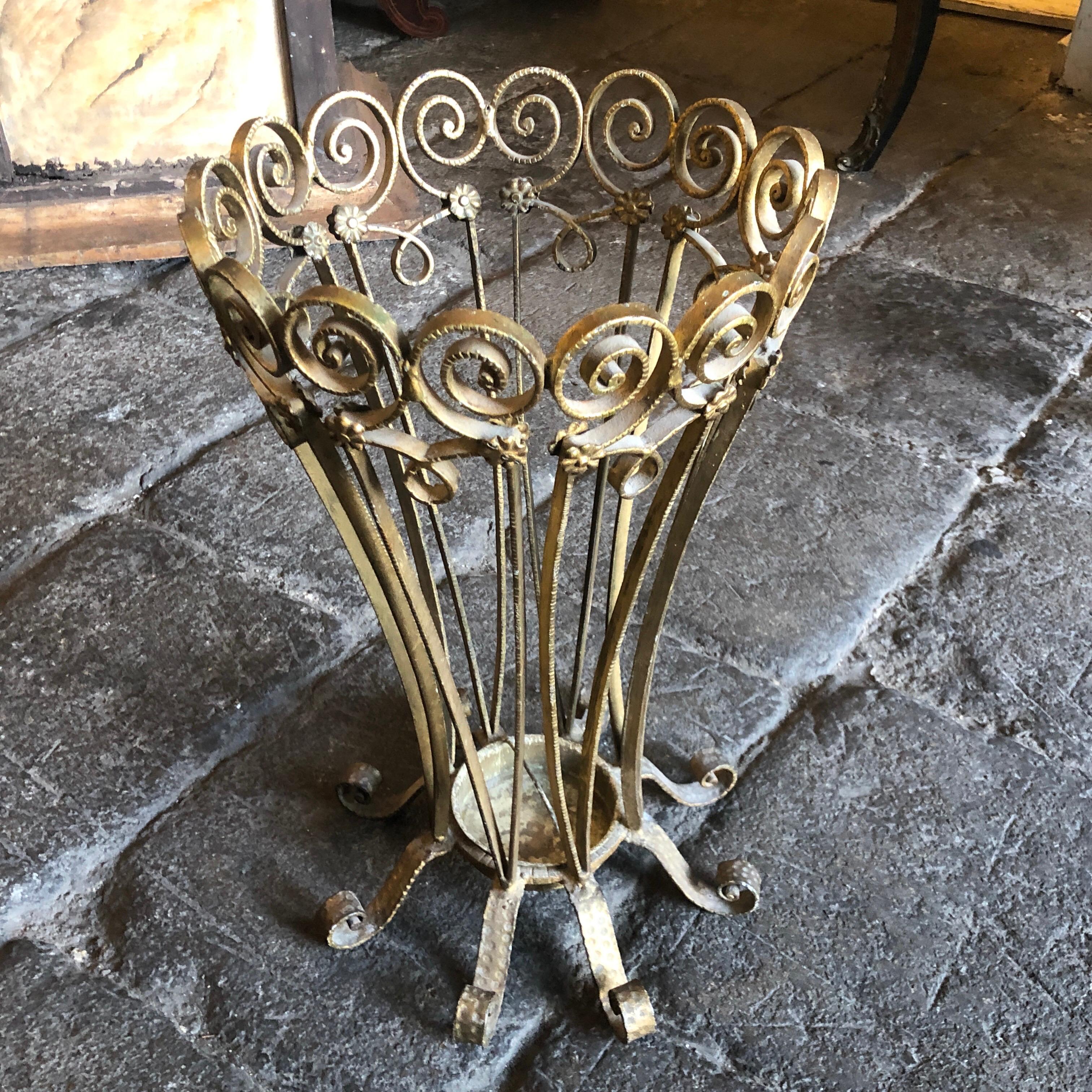 A stylish Italian umbrella stand manufactured in Italy in the 1960s, designed by Pier Luigi Colli, an Italian furniture designer known for his exquisite craftsmanship and innovative designs, and this umbrella stand showcases his talent and the