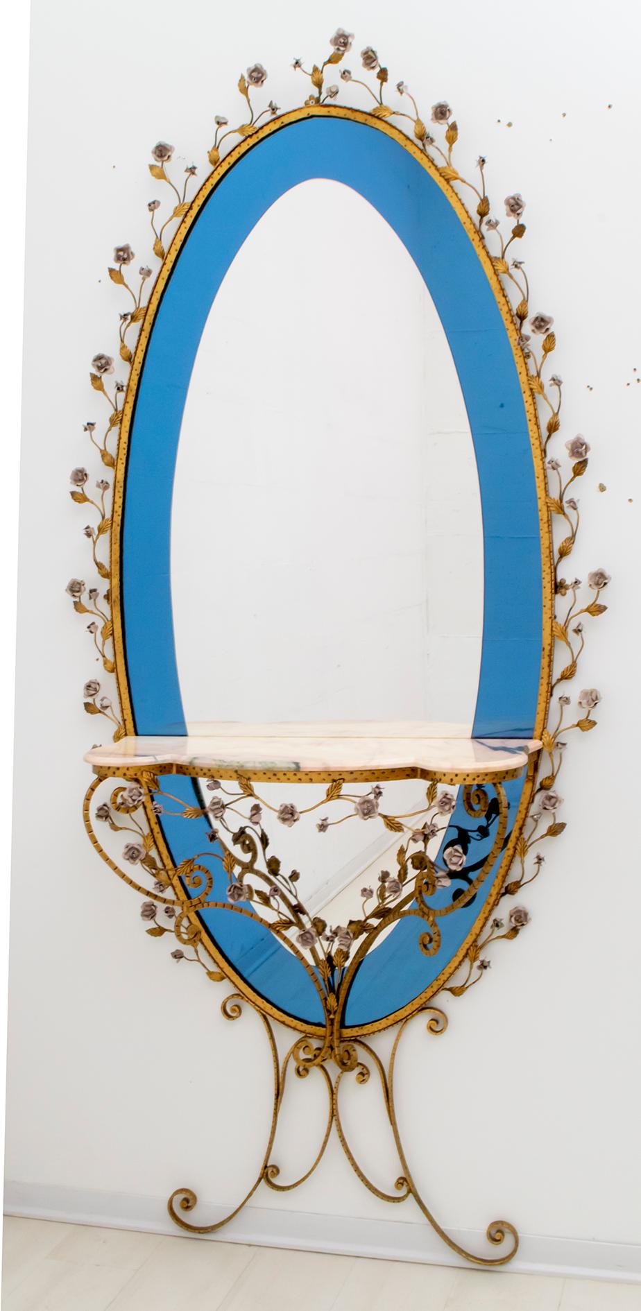 Beautiful entrance mirror with console, sophisticated, elegant, designed by Pier Luigi Colli, Italy, Turin 1950
The structure is in wrought iron, the handmade flowers in wrought iron, the mirror is in two colors, cobalt blue and transparent, the