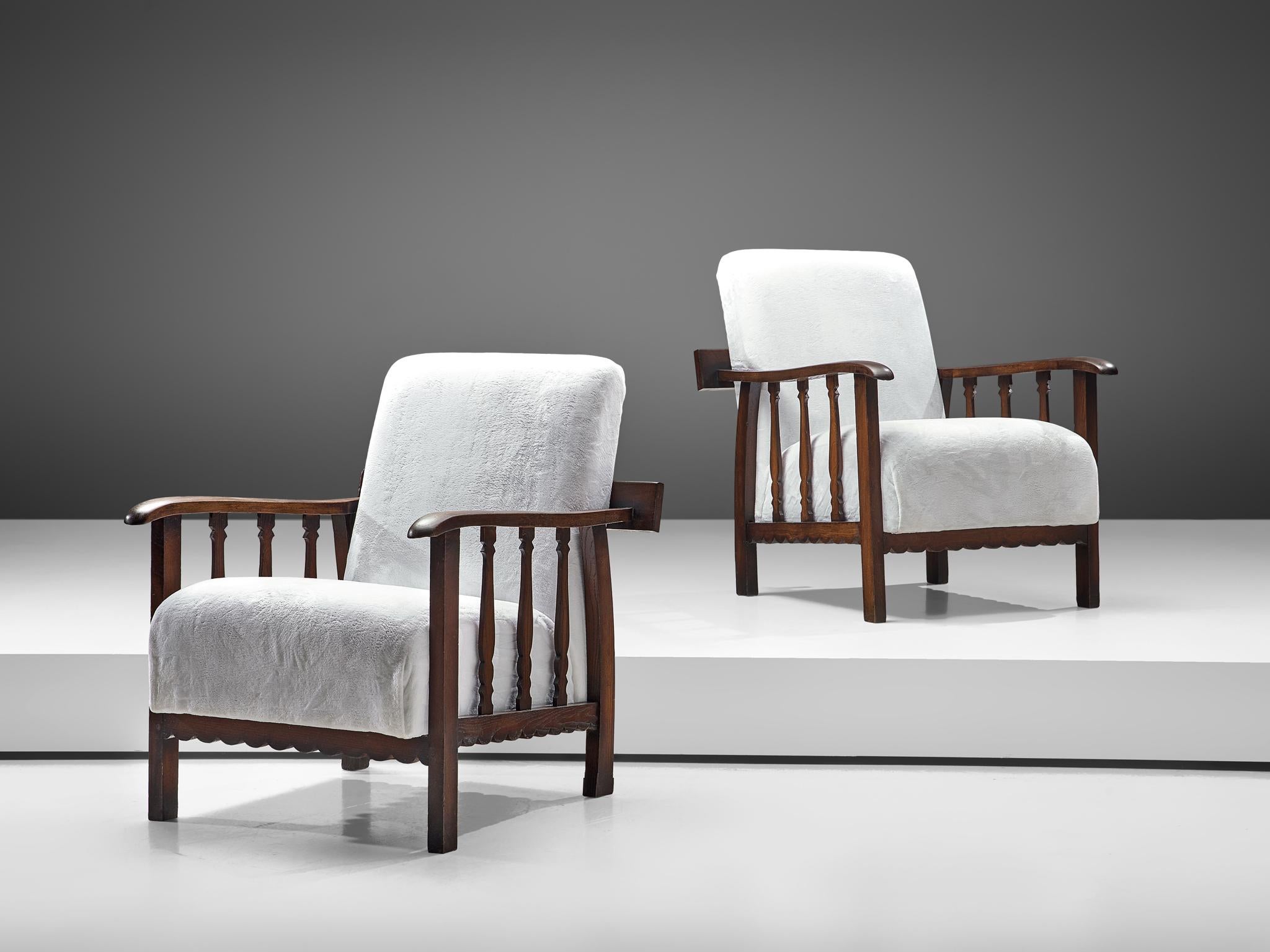 Pier Luigi Colli for Martinotti, pair of lounge chairs, darkened oak and fabric, Italy, 1940s

This beautiful set of armchairs is designed by the Italian designer Pier Luigi Colli and produced by his own company Martinotti, that was specialized in