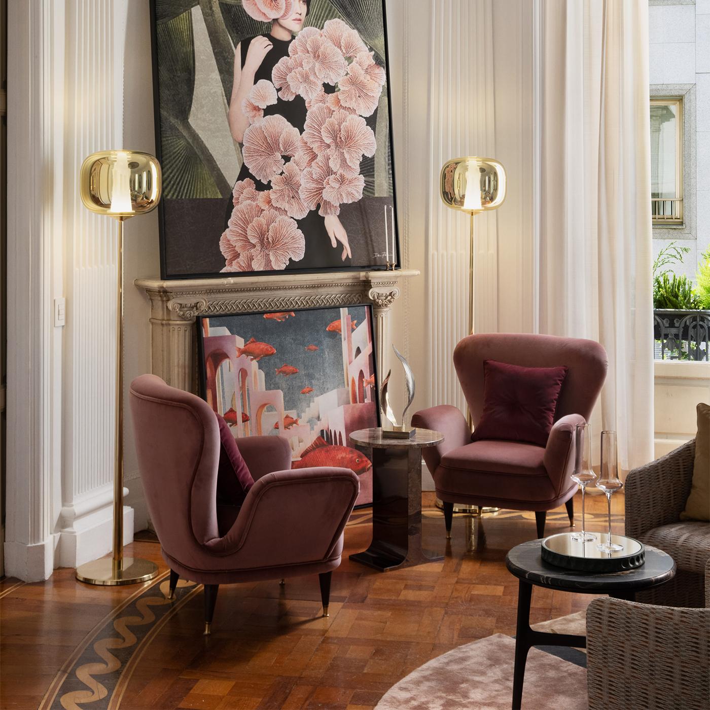 Experience the exquisite charm of the Piera Upholstered Pink Velvet Armchair, a statement piece that seamlessly blends timeless elegance with modern comfort. Featuring solid wood legs, finished in a matte dark walnut, this armchair offers a robust
