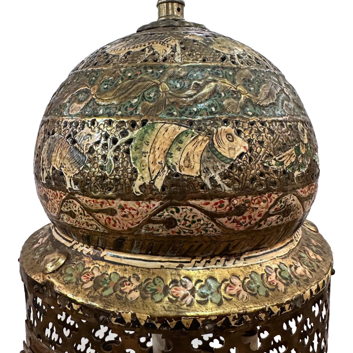 A circa 1920's Persian lantern with depictions of birds and animals with original painted finish and 4 interior lights.

Measurements:
Minimum drop: 25