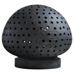 Vintage Pierced Black Ceramic Illuminating Light Sphere Lamp