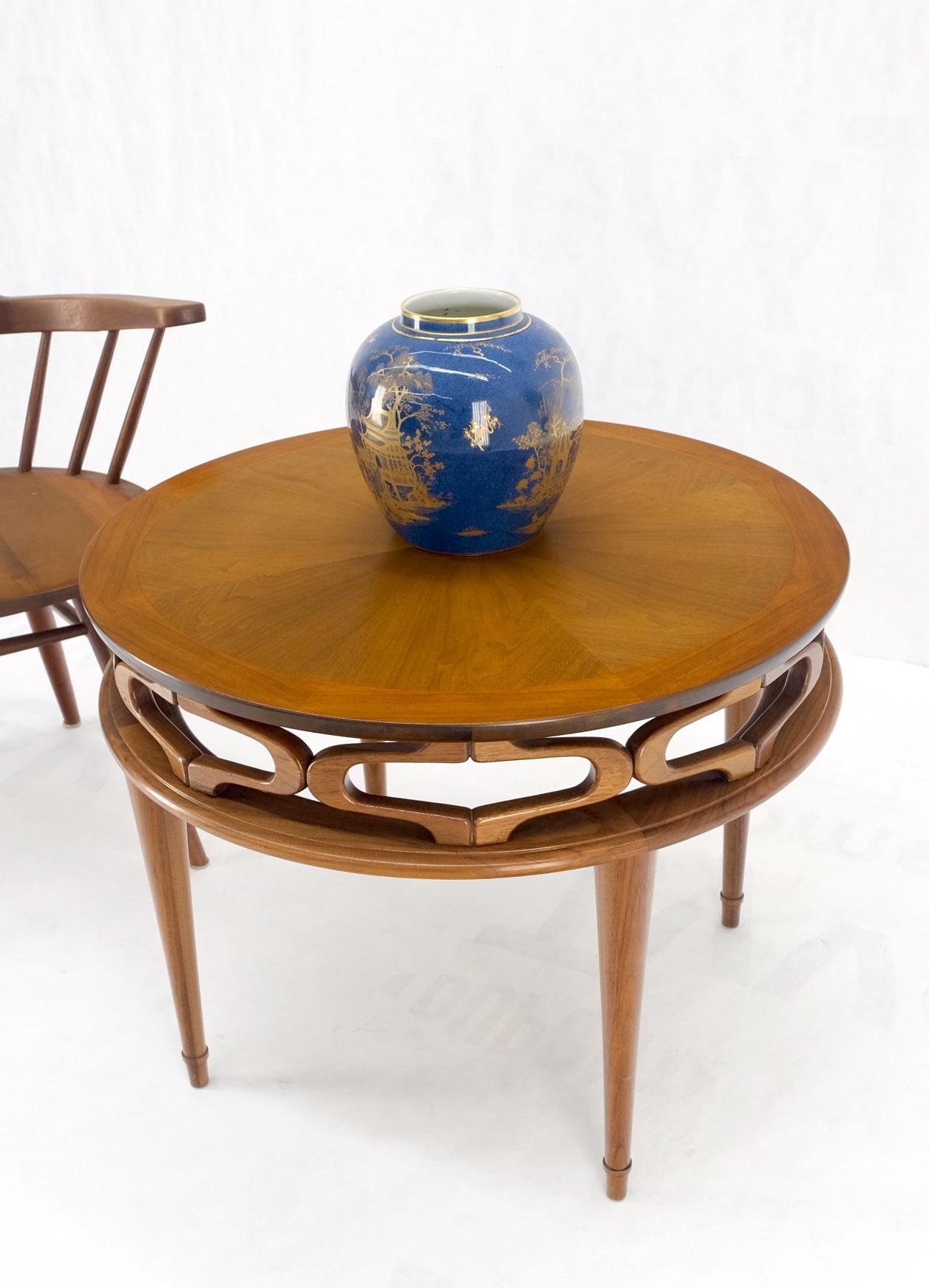 Pierced caved ornament round walnut banded Mid-Century Modern side stand end occasional table.