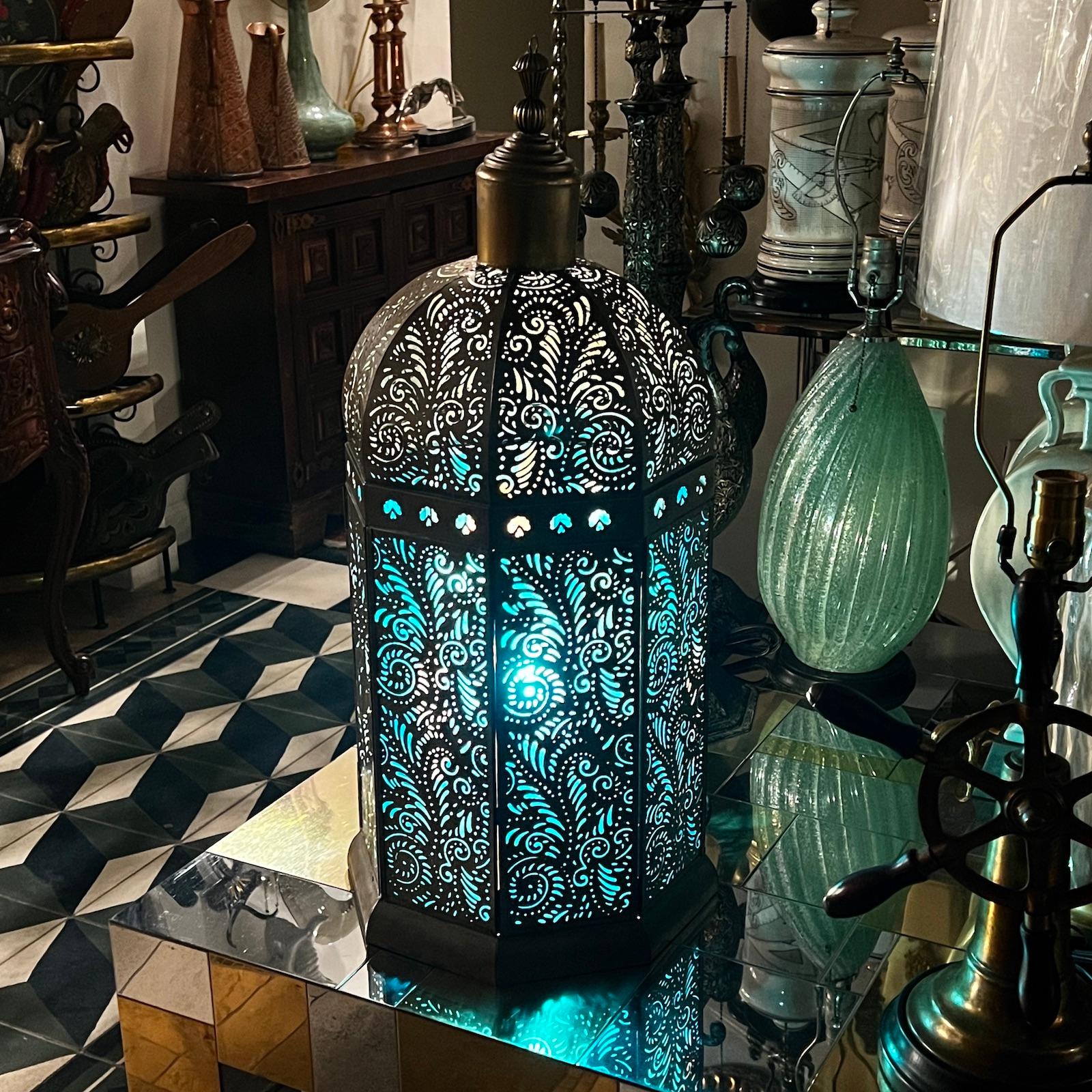 A circa 2000 vintage Turkish pierced brass lantern with turquoise glass inset.

Measurements:
Height: 28