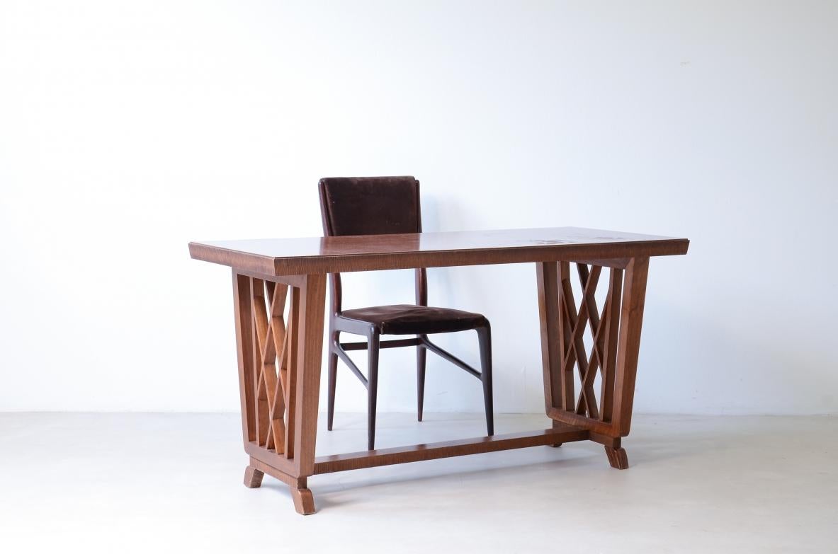 COD-2856
Pierluigi Colli

Elegant walnut desk with shaped uprights and a scratched wood band and under-band.

Certificate of provenance, Colli, Turin, ca. 1940.