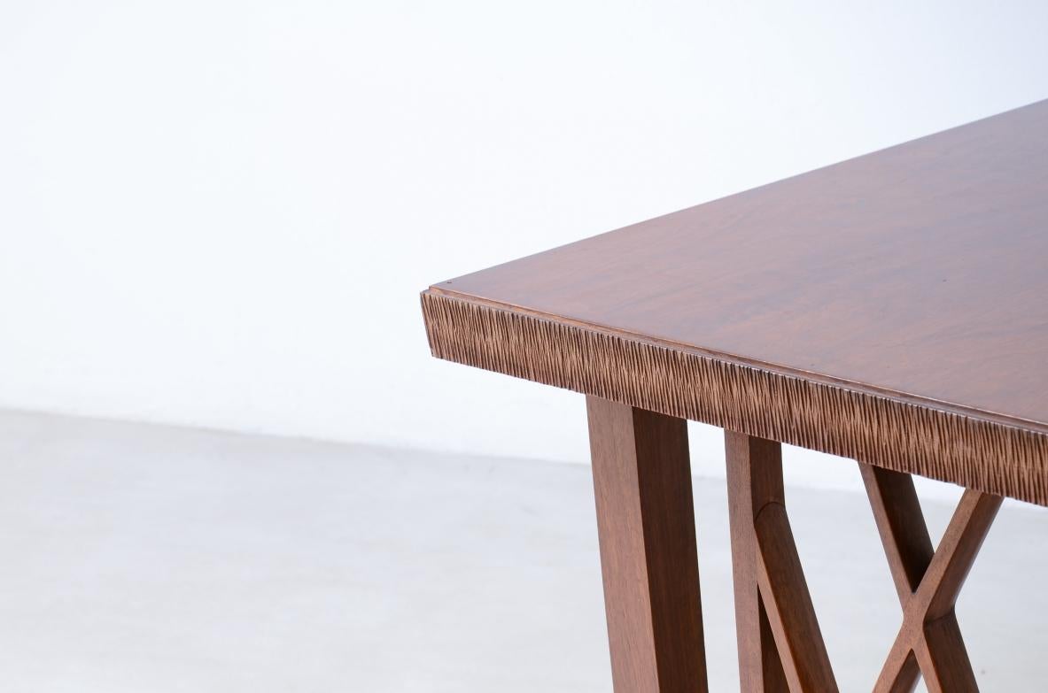 20th Century Pierluigi Colli 1940's elegant walnut desk with shaped uprights For Sale