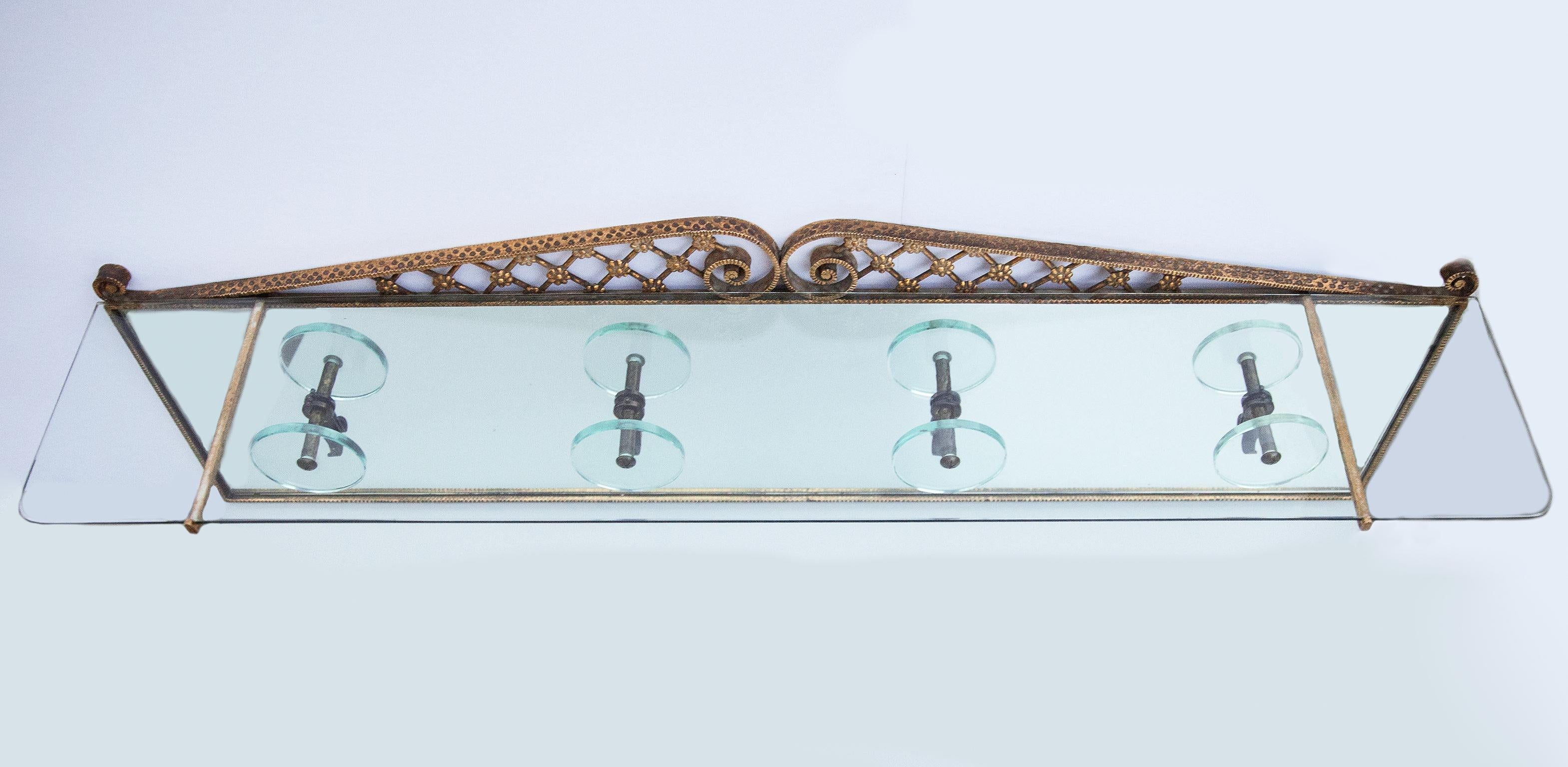 Pierluigi Colli for crystal Art coat rack with hat shelf , Italy circa 1950, tempered glass wall wardrobe with four knobs and transparent crystal top, brass coat hooks, gilt iron frame, very huge and elegant object. 

  