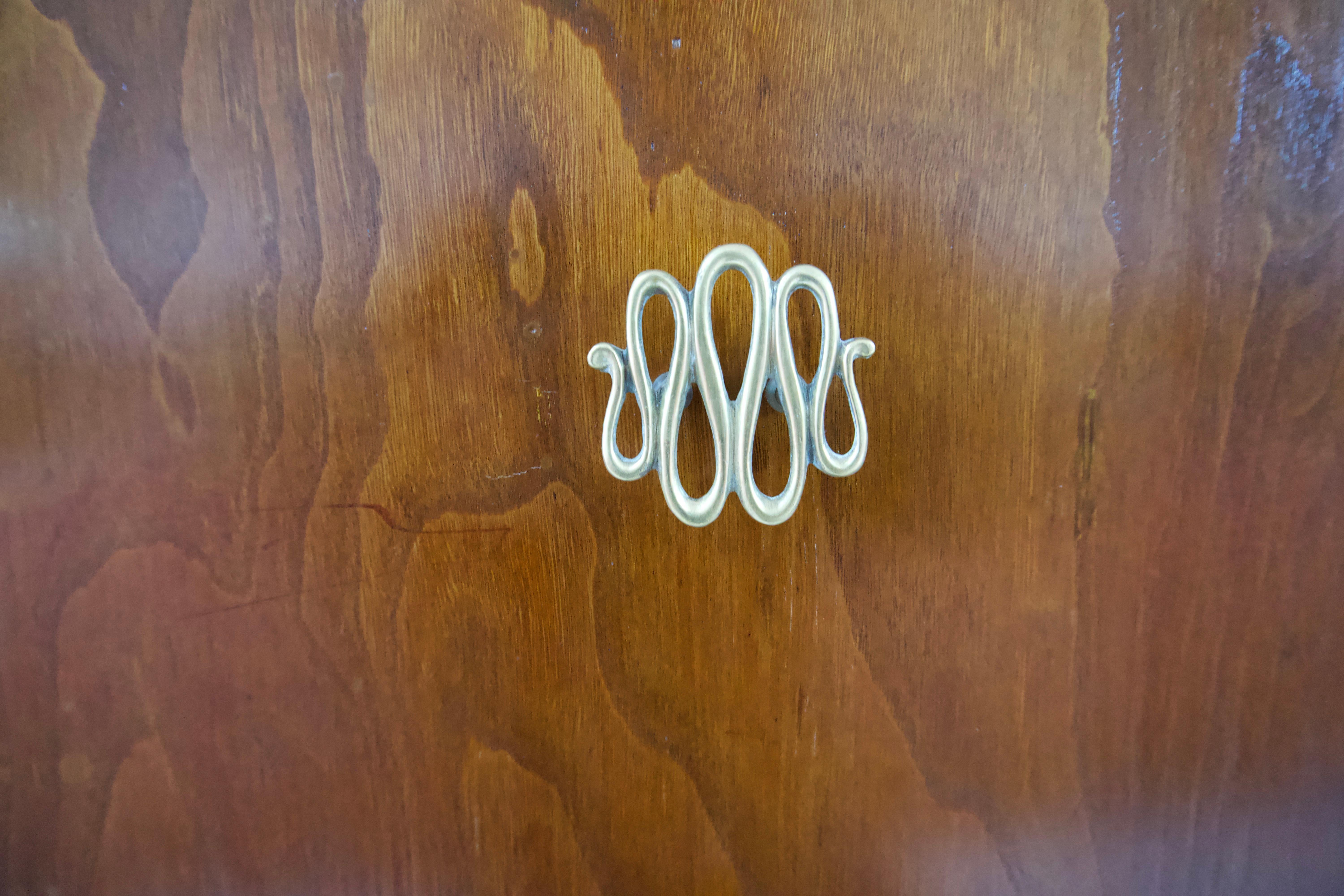 Brass Pierluigi Colli sideboard carved wood, veneered root, two doors, drawers, 1940