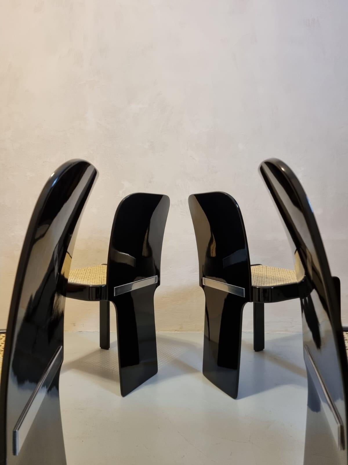 Chairs by Pierluigi Molinari for Pozzi 1970, black lacquered wood and restored seats.
