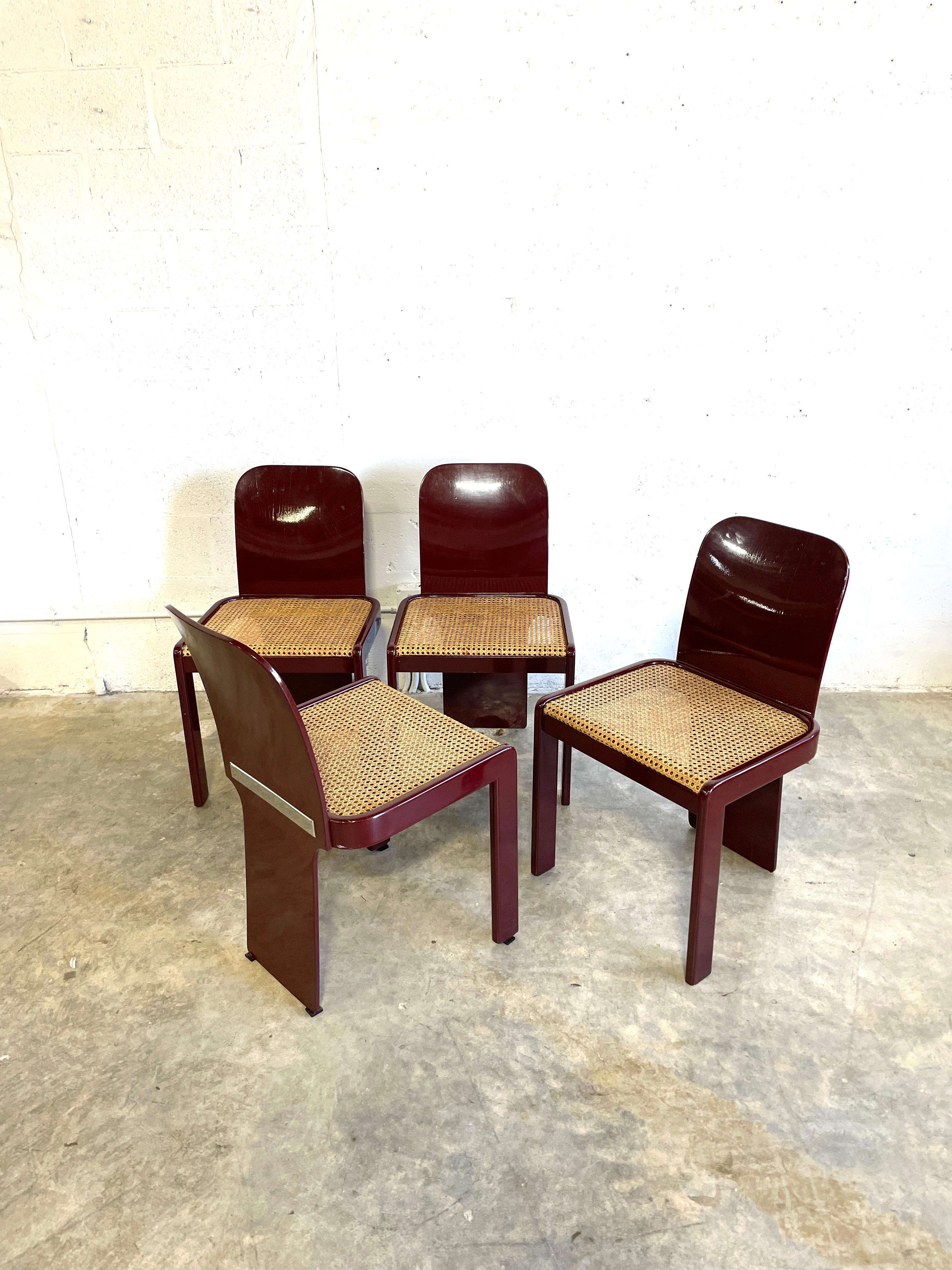 Set of 4 Pierluigi Molinari lacquered dining chairs. Made in Italy. Original burgundy color. 