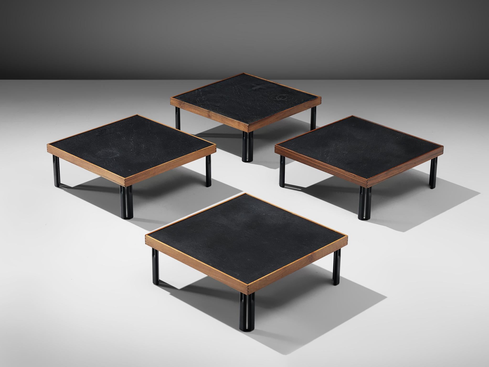 Piero De Martini for Cassina, set of four 'Naviglio' side tables, walnut, slate and metal, Italy, 1980s

A set of four small coffee tables, designed by Piero De Martini for Cassina. The low tables feature slate table tops, framed by edges in walnut.