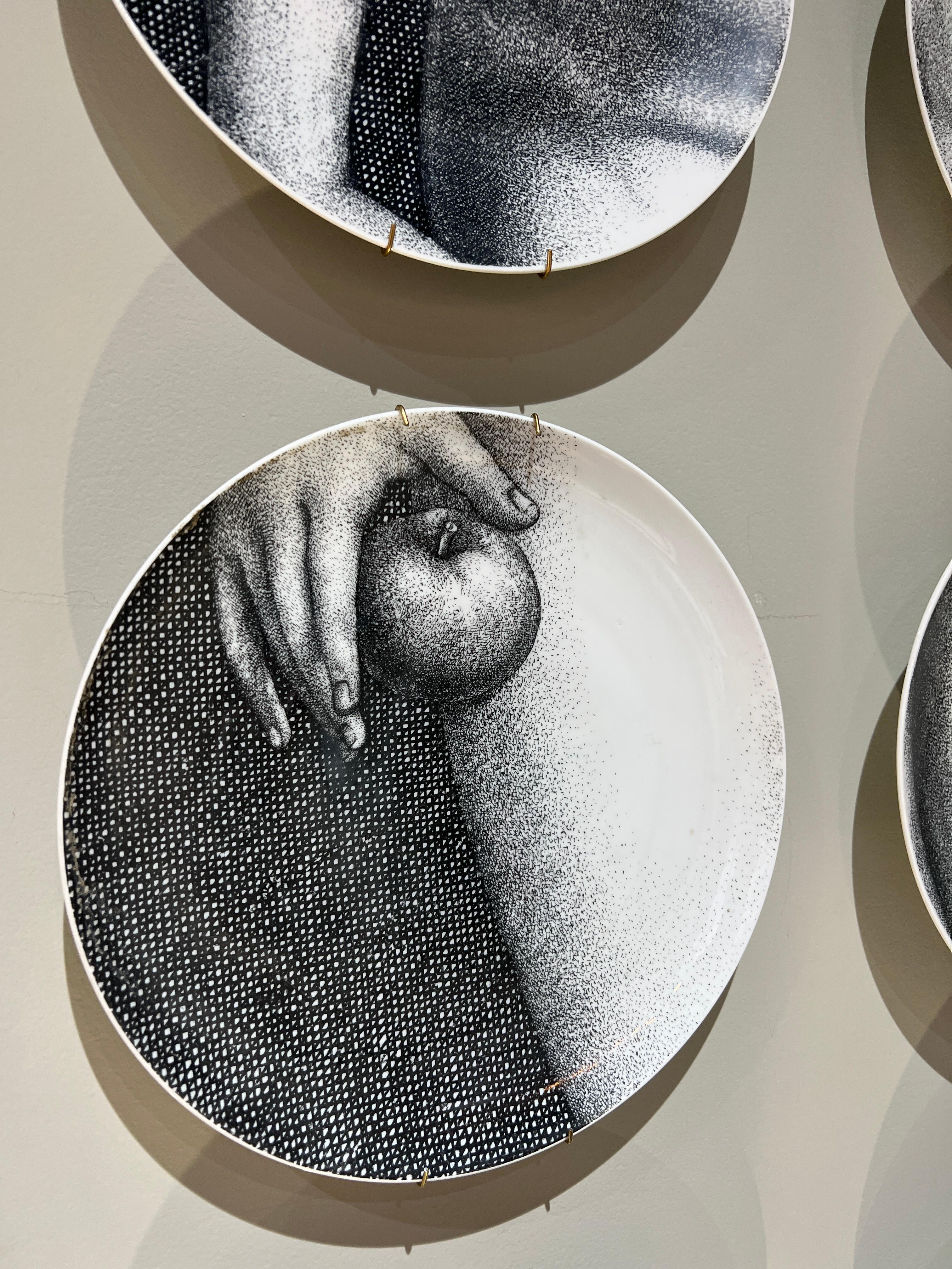 fornasetti adam and eve plates