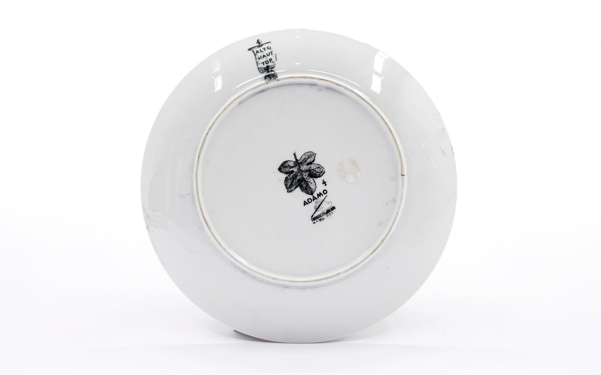 Piero Fornasetti Adamo or Adam porcelain plate number 4. Signed. Excellent condition.