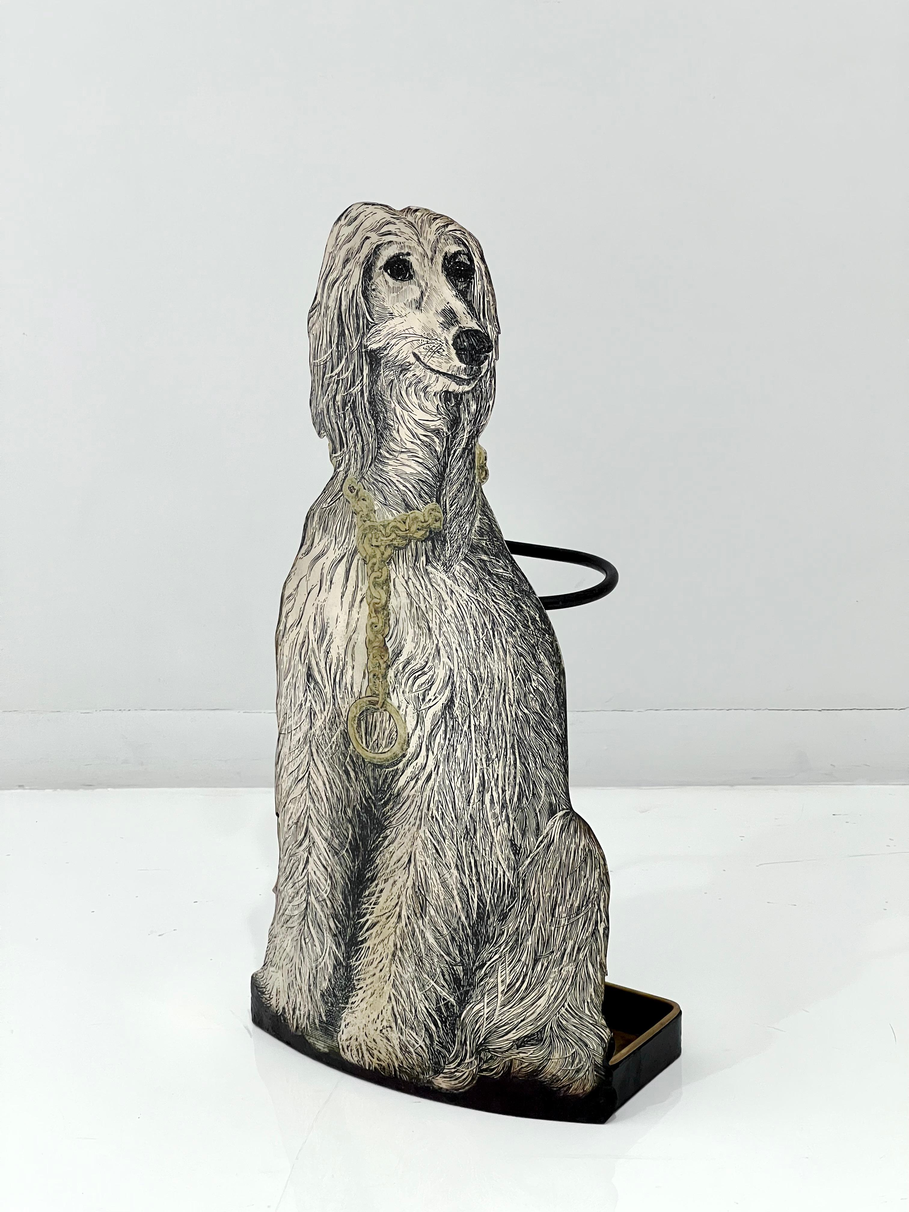 Delightful Piero Fornasetti umbrella stand depicting an Afghan Hound. Italy 1962, with back drip-tray.
