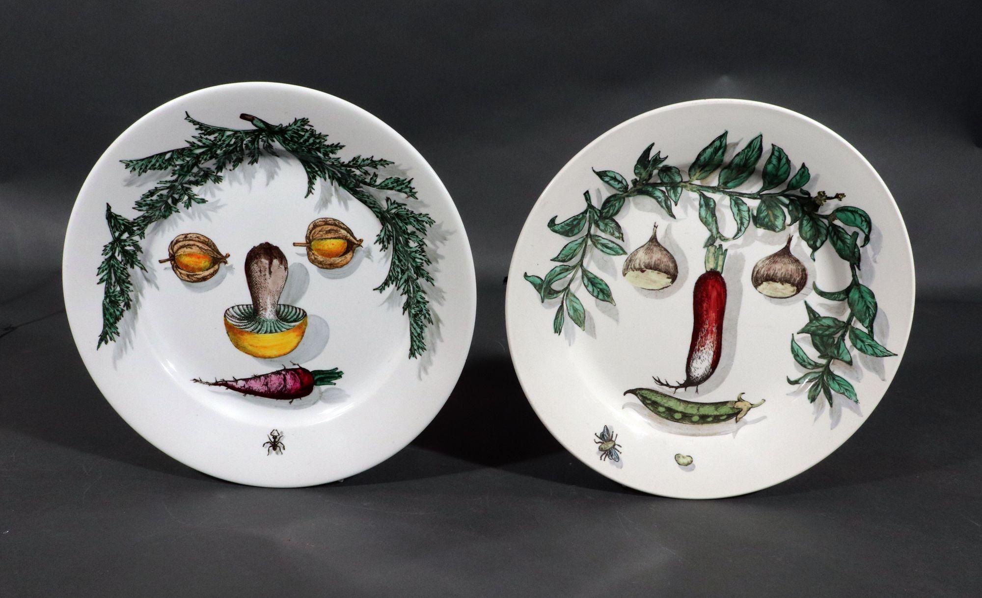 Piero Fornasetti Pottery Arcimboldesca Vegetable Face Plates,
After Giuseppe Arcimboldo,
 A Pair,
Circa 1955

The pottery plates are after Giuseppe Arcimboldo- the design of a face creatively designed with the use of various vegetables and plants. 
