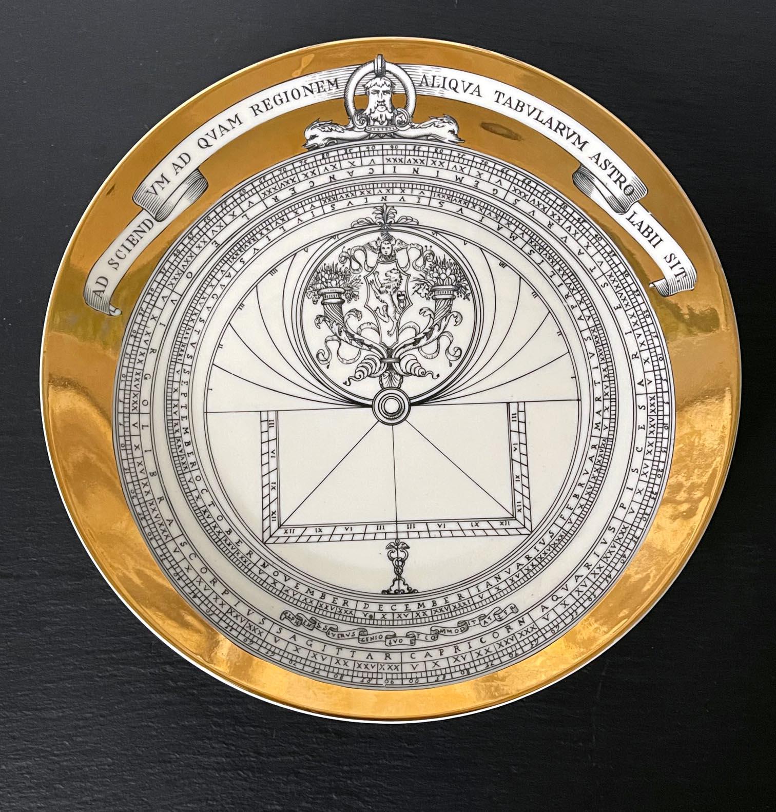 A porcelain plate designed by Piero Fornasetti as no,3 of the twelves-piece set of the Astrolabe series between 1965-1976. The series each depicts an Astrolabio, an elaborate inclinometer of classical antiquity time used by astronomers, navigators,