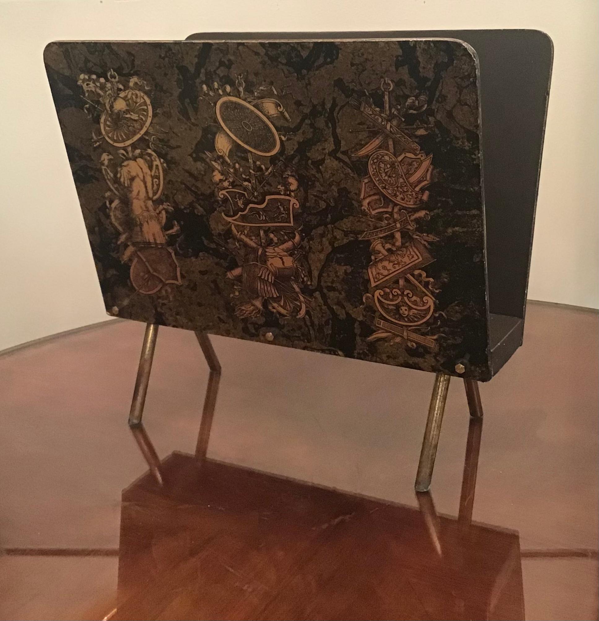 Piero Fornasetti “Bucciarelli “ magazine rack brass lacquered wood, 1950, Italy.