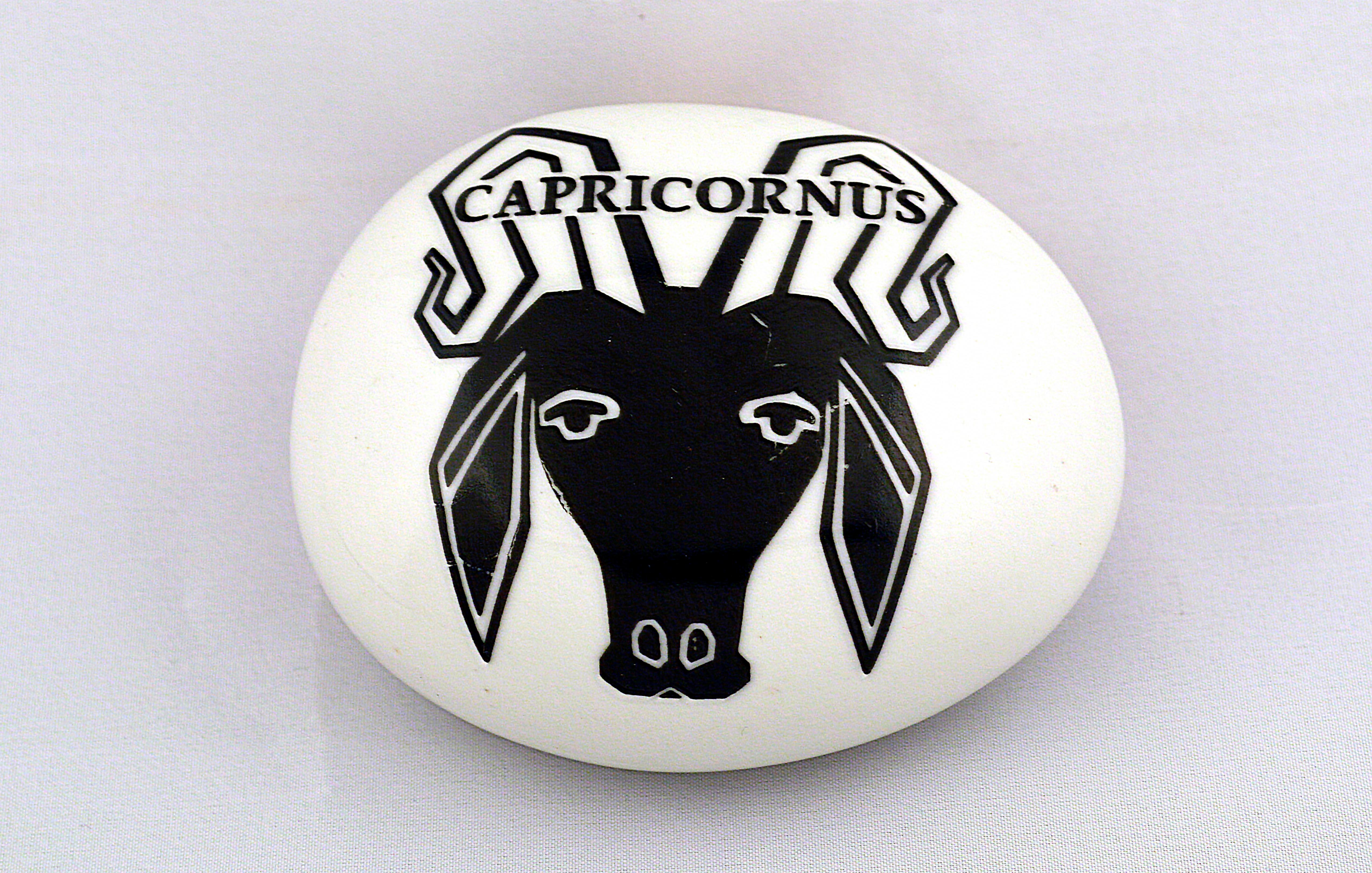 Piero Fornasetti Capricorn zodiac ceramic paperweight
1950s.

The white oval paperweight is decorated in black with the head of a goat and Capricorn in black above

Mark: Fornasetti-Milano/Made in Italy in black on the base.

Capricorn is the