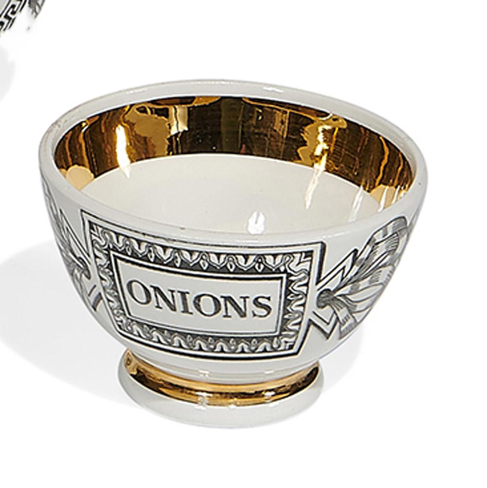 Piero Fornasetti ceramic barware snack appetizer bowls, 
1960s 

Each pottery barware appetizer bowl has a different design of items related to bar snacks- cheese, olives, onion, cocktail sausages, and almonds and peanuts. The name of the content
