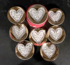 Piero Fornasetti Ceramic "Love" Coasters, a Complete Set of Eight with Box