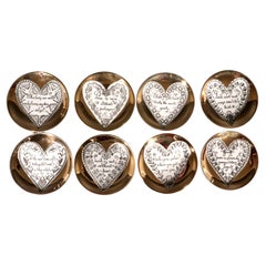 Piero Fornasetti Ceramic "Love" Coasters, a Complete Set of Eight with Box