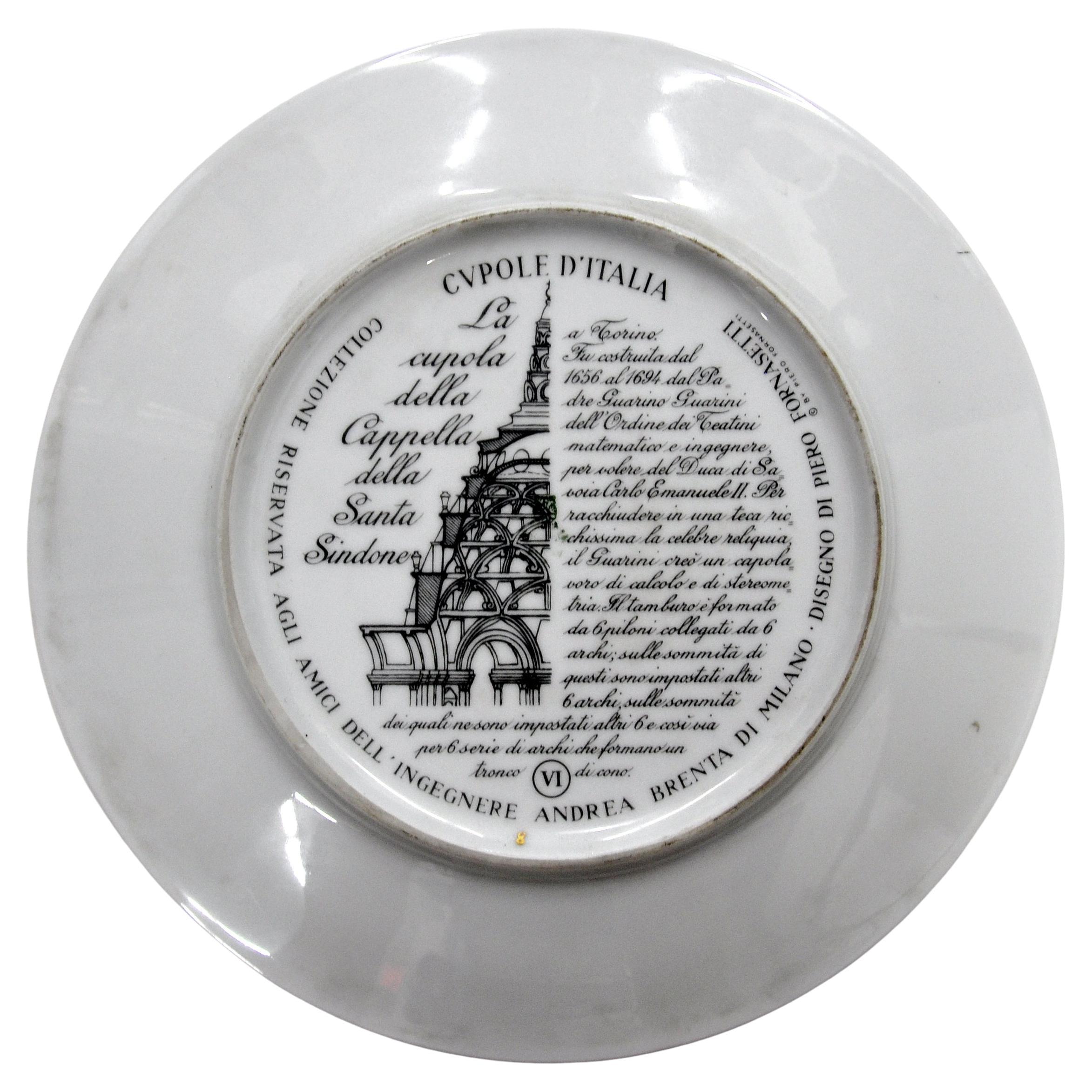 An original vintage decorative plate from the Cupole d'Italia series designed and manufactured by the Italian master of playful and surreal self-expression Piero Fornasetti in the 1960s. Fornasetti loved incorporating architectural elements in his